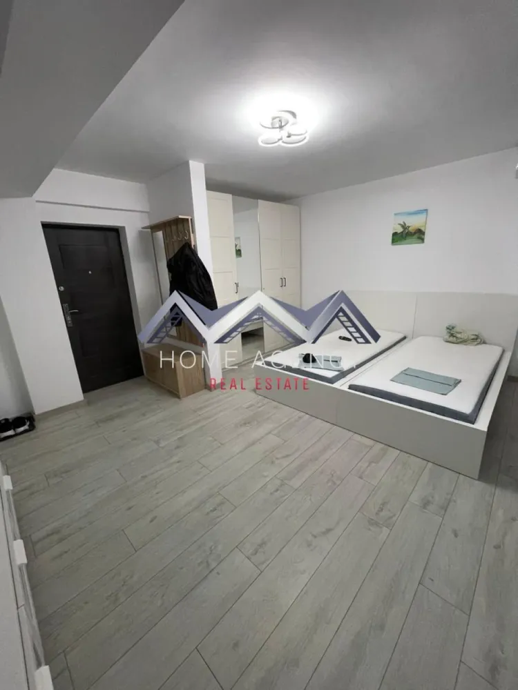 Garsonieră cu bucătărie închisă | include parcare