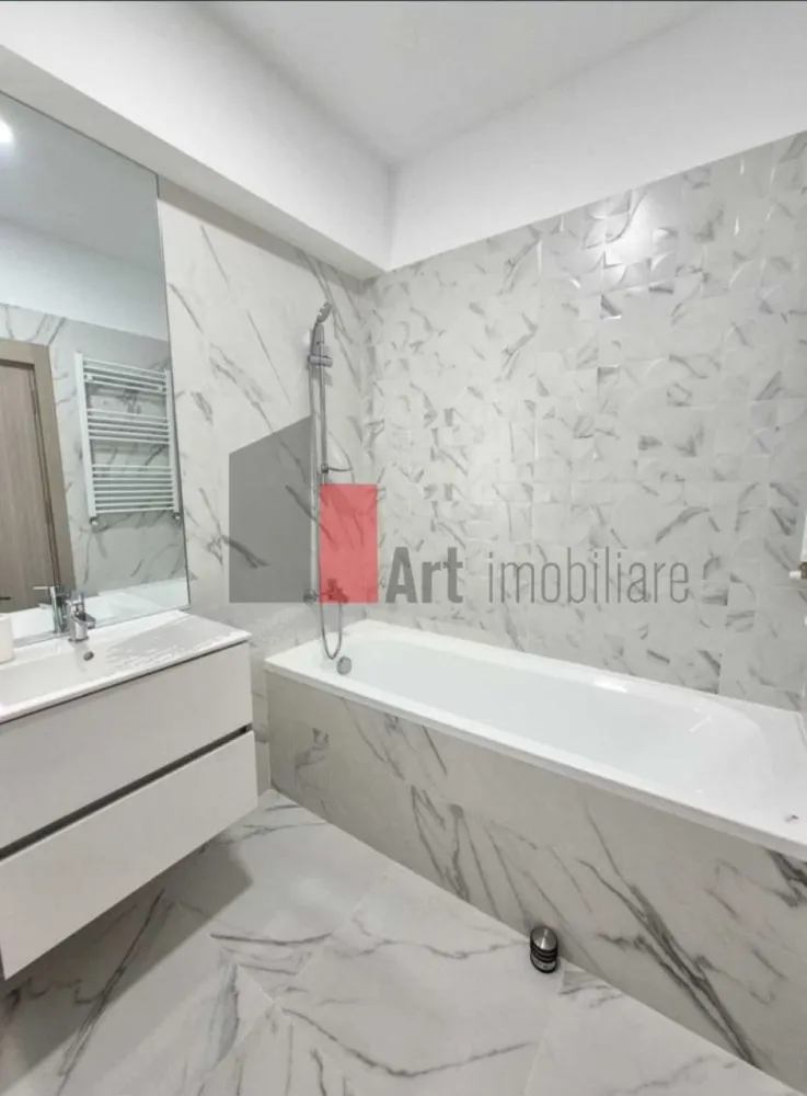Inchiriere apartament 2 camere in zona Gorjului-NOVUM 56 - Oferim spre inchiriere un apartament deosebit de 2 camere situat in Complex Novum 56 in zona Gorjului,pe B-dul Timisoara nr 56.
Apartamentul se afla la prima inchiriere si este situat la etajul 3 intr-un imobil cu 10 etaje construit in anul 2025.
Suprafata utila este de 54 mp.
Este dotat cu mobilier si electrocasnice noi(masina de spalat rufe,cuptor electric,plita gaz,frigider,aer conditionat,TV Smart).
Incalzirea este realizata cu centrala proprie cu incalzire in pardosealasi termostat wi-fi,iar racirea cu aer conditionat de 12 000 BTU cu Wi-Fi.
Are ca vecinatati Penny/Lidl/Jysk,statia de metrou Gorjului fiind la doar 7 minute de mers pe jos,iar autobuzul si tramvaiul au statie la intrarea in complex.
Pretul chiriei este de 570 euro+o luna garantie