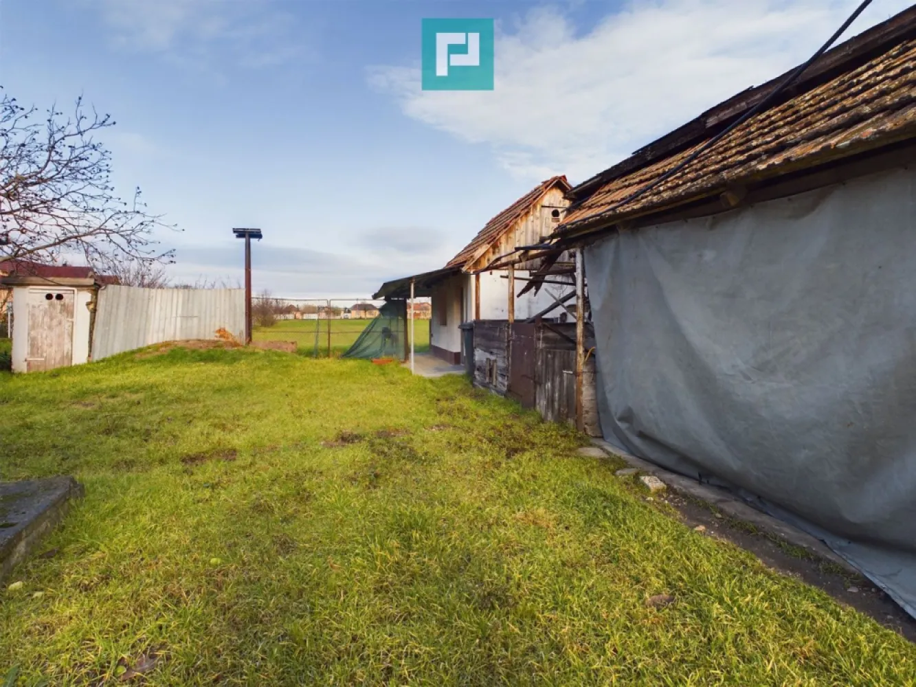 Casă cu teren generos, Turnu