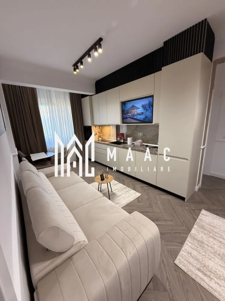 Apartament 3 camere | Etajul 1| 75MPU | Cireșica - MAAC Imobiliare vă propune spre închiriere un apartament modern, la prima închiriere, cu 3 camere, cu o suprafață utilă de 75 mp, situat la etajul 1 al unui imobil din zona Cireșica. Apartamentul beneficiază de două locuri de parcare private subterane, iar imobilul dispune de lift. Amplasarea apartamentului permite acces rapid către centre comerciale, instituții bancare, unități de învățământ, farmacii și toate facilitățile urbane. Apartamentul este decomandat și cuprinde: 2 dormitoare, bucătărie, living, baie și balcon. Dotări și avantaje: apartament nou, luminos; finisaje moderne și mobilă nouă; bucătărie complet utilată; baie cu cabină de duș și geam de aerisire; două locuri de parcare subterane private; lift. Închirierea se face pe termen de minim 1 an. Nu se acceptă animale de companie. Fumatul este interzis în apartament. Se percepe garanție în cuantumul unei chirii lunare. Pentru mai multe detalii și programarea unei vizionări, vă rugăm să ne contactați, menționând ID: CP2923158. }}