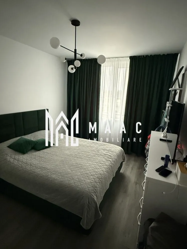 Apartament 3 camere I Etaj 2 I Balcon | Selimbar - MAAC Imobiliare vă propune spre vânzare un apartament modern cu 3 camere, situat în Șelimbăr, într-o zonă liniștită, cu acces facil către principalele puncte de interes ale orașului. Caracteristici principale: Suprafață utilă: optim compartimentată Compartimentare: Living spațios cu bucătărie open space 2 dormitoare de 13 mp și 14 mp Baie cu geam de aerisire Balcon generos Dotări și finisaje: Încălzire în pardoseală pentru confort termic sporit Geamuri tripan – izolație fonică și termică excelentă Aer condiționat Finisaje moderne, atent alese Apartamentul se află într-o zonă foarte căutată din Șelimbăr, ideală atât pentru locuință permanentă, cât și pentru investiție, cu acces rapid către magazine, școli, mijloace de transport și puncte comerciale importante. Pentru mai multe detalii și vizionări, precizati telefonic ca ati vazut anuntul cu ID: CP2772301 }}
