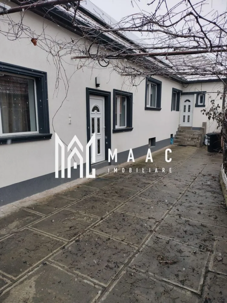Casă individualăI I 80 mp utili I Teren 280 mp I Săliște-Sibiu - MAAC Imobiliare va propune spre vânzare casă individuală, complet renovată recent, situată ultracentral în Săliște – Sibiu, la doar 2 minute de centru, pe o stradă liniștită, ferită de traficul principal. Proprietatea îmbină perfect confortul modern cu intimitatea și eficiența energetică ridicată, fiind ideală pentru locuire permanentă sau casă de vacanță. 🏠 Compartimentare Living luminos 3 camere Bucătărie 2 băi Cameră tehnică 2 holuri Pivniță cu 2 încăperi Garaj Anexe pentru depozitare 🔨 Renovare & finisaje Casa a fost renovată complet recent: Instalații electrice și sanitare noi Uși și ferestre schimbate Construcție din cărămidă mare tip Porotherm Gresie și faianță premium (bucătărie, băi, holuri) Parchet în camere și living Finisaje moderne, durabile și ușor de întreținut 📐 Detalii proprietate Suprafață teren: 280 mp Suprafață casă: 80 mp utili Pivniță: 40 mp (2 încăperi) Grădină: aprox. 100 mp Garaj + anexe gospodărești 🌿 Exterior & curte Curte cimentată – întreținere minimă Aproximativ 100 mp grădină Curte acoperită de viță de vie matură 🌱 Microclimat natural plăcut vara Umbră, răcoare și intimitate Spațiu ideal pentru relaxare și petrecerea timpului liber ⚡ Dotări PREMIUM – diferențiator major Panouri fotovoltaice – 3,7 kW Pompă de căldură Costuri foarte mici de întreținere Eficiență energetică ridicată Confort termic pe tot parcursul anului Sistem de încălzire mixt: Calorifere Încălzire în pardoseală (băi, living, bucătărie) 📍 Localizare Situată în cea mai bună zonă din Săliștea Sibiului: Ultracentral 2 minute de centru Stradă liniștită Ideală pentru liniște, intimitate și confort 📞 Pentru mai multe detalii si programarea unei vizionari va rugam sa specificati ID: CP2898250.
