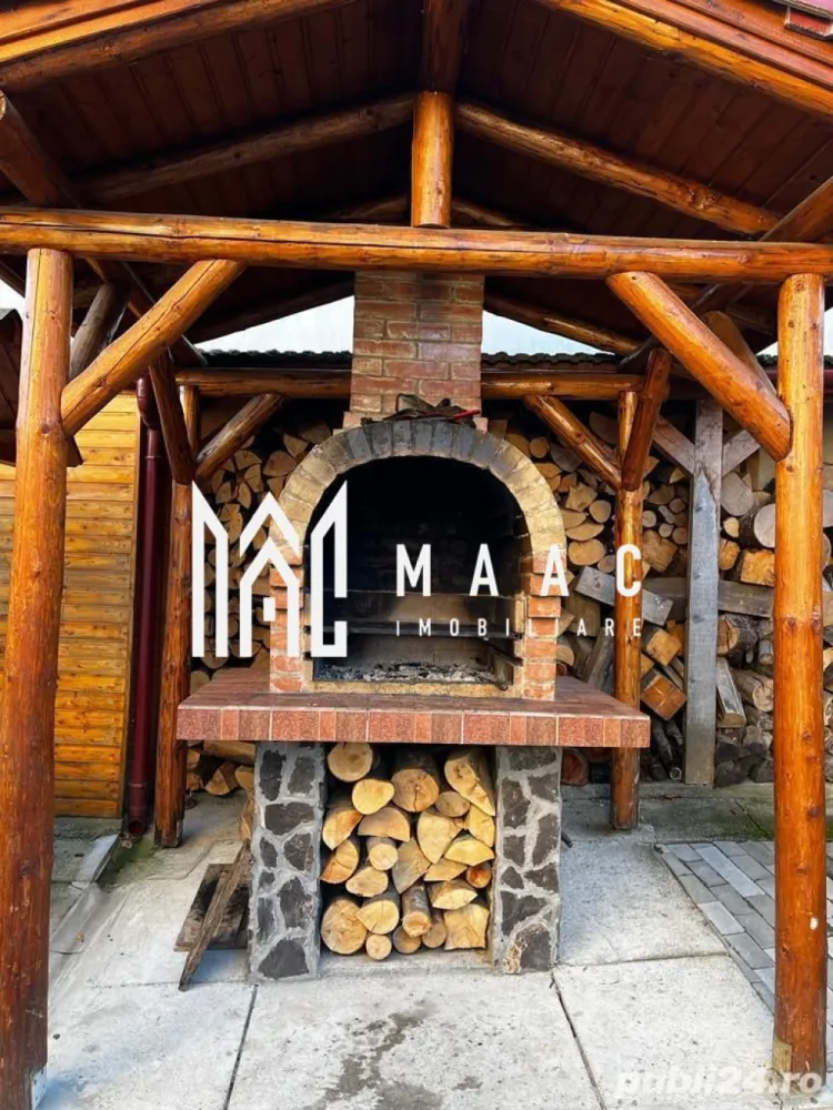 Casa | Tocile | 4 camere | Teren 500 mp - MAAC Imobiliare va prezinta o casa de vacanta pe structura de lemn cu suprafata de 120 mp utili si teren de 500 mp. Casa se preda complet mobilata si utilata dupa cum se vede in imagini. Compartimentarea este in felul urmator: Parter: living cu bucatarie open-space si baie Etaj: 3 dormitoare si baie De asemenea proprietatea ofera pivnita, zona pentru gratar si o gradina spatioasa. Pentru mai multe informatii, precizati telefonic ca ati vizionat anuntul cu ID: CP1951632. }}