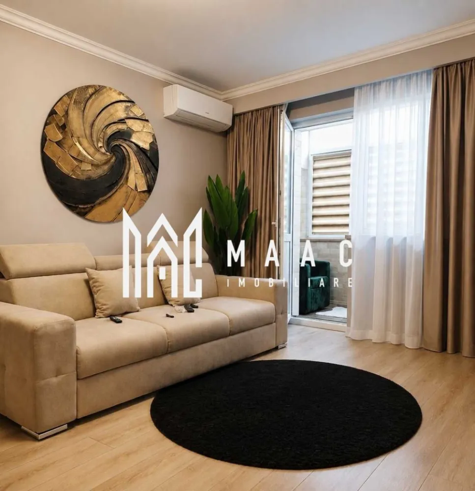 Apartament 2 camere | Ostroveni | 58 mpu | Ostroveni | - MAAC Imobiliare vă propune spre vânzare un apartament cu 2 camere decomandat, complet reconstruit la standarde premium, situat în zona DSV – Ostroveni, la etajul 4 din 10, într-un bloc solid construit după cutremurul din 1977, conform noilor norme de rezistență.

Această proprietate nu este doar renovată, ci reconstruită integral, fiind realizată ca proiect personal, fără compromisuri privind calitatea materialelor sau execuția. Lucrările s-au desfășurat pe parcursul a aproximativ 8 luni, cu accent pe durabilitate, eficiență energetică și confort.

Caracteristici principale:
Apartament cu 2 camere, complet decomandat
Suprafață utilă: 58 mp (55 mp în acte + balcon integrat)
Etaj 4 din 10
Apartament de mijloc, foarte eficient energetic
Se poate vinde complet mobilat și utilat sau parțial mobilat, în funcție de preferințele cumpărătorului
Disponibil pentru mutare imediată
Compartimentare:
Living luminos
Dormitor cu dressing
Bucătărie
Baie
Hol pătrat generos de aproximativ 9 mp
Balcon integrat în suprafața utilă
Reconstrucție și finisaje:
Pereți decopertați până la tencuiala originală și refăcuți integral
Finisaje realizate cu tencuială Rimano, fără placări cu rigips pe pereți sau tavane
Rigips utilizat doar punctual (tavan baie și lateralele balconului)
Instalație electrică complet nouă din cupru
Circuit separat pentru fiecare priză
Minimum două prize în fiecare încăpere
Contor electric relocat pe casa scării
Instalație sanitară refăcută integral
Balcon complet izolat cu vată de sticlă și prevăzut cu calorifer propriu
Nișele tehnice și coloanele blocului au fost izolate cu vată minerală de înaltă densitate pentru confort termic și fonic
Nișele din camere sunt etanșate pentru reducerea pierderilor de căldură și a zgomotului
Dotări:
2 aparate de aer condiționat Fujitsu 12.000 BTU A++
Mașină de spălat rufe A++
Uscător de rufe A++
Frigider
Plită cu inducție
Hotă
Cuptor electric
Cuptor cu microunde
2 televizoare Smart (65" și 55")
Sistem Home Cinema
Espressor automat de cafea
Mop electric
Aspirator silențios
Avantaje:
Apartamentul nu a fost locuit după finalizarea lucrărilor
Electrocasnicele au fost doar testate pentru verificarea funcționării
Investiție documentată, de peste 30.000 €, cu fotografii din toate etapele lucrării și facturi disponibile
Vedere deschisă, fără bloc în față
Bloc liniștit, cu vecini stabili
Locuri de parcare disponibile atât în fața, cât și în spatele blocului
Costuri reduse de întreținere datorită eficienței energetice ridicate

Această proprietate se adresează cumpărătorilor care apreciază calitatea execuției și doresc un apartament în care fiecare detaliu a fost realizat cu atenție și fără compromisuri. Este o locuință pregătită pentru mutare imediată, fără a necesita investiții suplimentare.

Pentru informații suplimentare și programarea unei vizionări specificati ID 3192692