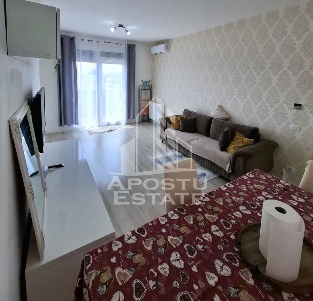 Apartament 2 camere, 52 mp utili. Loc de parcare - Apostu Estate va propune spre inchiriere un apartament cu 2 camere, situat la etajul 4, intr-o zona excelenta, in apropiere de Afi, Stadionul Francisc von Neuman si statiile de mijloace de transport in comun, oferind acces rapid catre principalele puncte de interes ale orasului.

Cu o suprafata utila de 52 mp, locuinta este compartimentata eficient si dispune de 1 dormitor confortabil, 1 living luminos, 1 bucatarie separata si 1 baie dotata cu cada, oferind un ambient placut si functional.

Apartamentul se inchiriaza complet mobilat si utilat, fiind pregatit pentru mutare imediata, astfel incat viitorii chiriasi sa beneficieze de tot confortul necesar inca din prima zi. 
In plus, proprietatea dispune si de loc de parcare, un avantaj important pentru confortul zilnic.

Datorita amplasarii excelente si facilitatilor oferite, aceasta proprietate este ideala pentru persoane active, cupluri sau familii care isi doresc o locuinta moderna, practica si bine pozitionata.

Apartamentul se inchiriaza pe termen lung. Pentru mai multe informatii si programarea unei vizionari, echipa Apostu Estate va sta la dispozitie.
ID: CP3198072