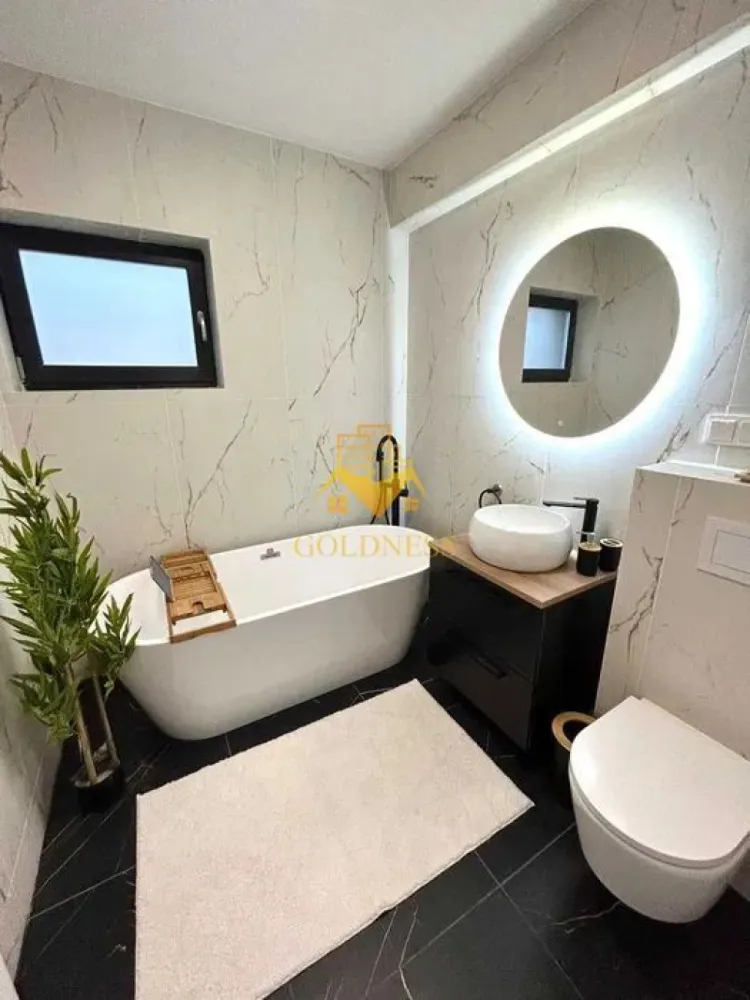 Casa individuala, 4 camere, garaj ,gradina, 3 bai, Popesti zona Baciu - GOLDNESS Imobiliare vă propune spre închiriere casa individuala cu 4 camere complet mobilat și utilata, in Popesti. Dispune de loc de parcare acoperita! Se află în apropierea stațiilor de transport în comun, magazine, restaurante, spații verzi, farmacii, etc. Apartamentul este compartimentat astfel: - dormitor cu pat matrimonial, dressing, noptiere, baie matrimoniala - dormitor, care se mobileaza la cerere - dormitor, care se mobileaza la cerere - living cu bucatarie open space complet utilată și mobilată, canapea extensibilă, loc de servit masa - baie cu cabina de dus, calorifer port prosop și dulap pentru depozitare. - baie cu cada, calorifer port prosop și dulap pentru depozitare. - debara - terasa de 60 mp. - curte 340 mp Imobilul este dotat cu toate cele necesare- centrală proprie, frigider, aragaz, hotă, mașină de spălat haine, etc. Dacă sunteți interesați de acest apartament și doriți să îl vizionați, dar și pentru alte oferte nu ezitați să ne contactați telefonic sau prin e-mail. Vă stăm la dispoziție! Pentru intermediere se percepe un comision de 50% din prețul chiriei! }}