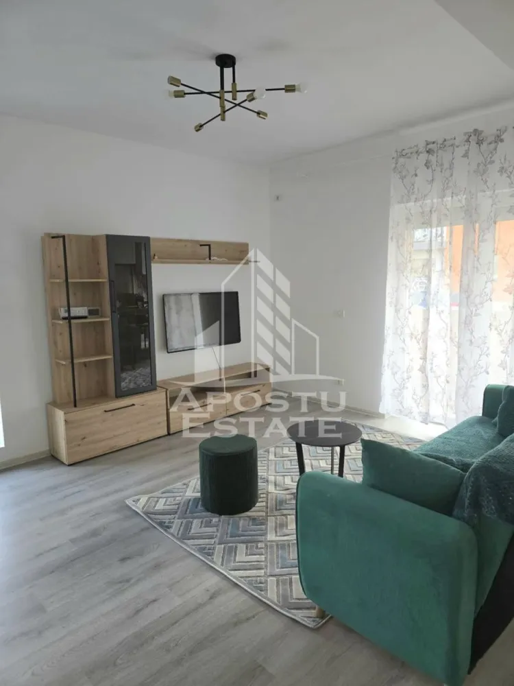 Apartament cu 2 camere,pet friendly,Giroc - Agentia Apostu Estate va ofera spre inchiriere un apartament cu 2 camere, amenajat modern, situat la parterul unui imobil nou din Giroc, intr-o zona foarte buna, in apropiere de Lidl si Future Residence.

Apartamentul dispune de o suprafata utila de 48 mp, la care se adauga un balcon generos de 8 mp. 

Compartimentarea este practica, cu living si bucatarie open space, dormitor, baie(cu cabina de dus)3 si balcon, fiind ideal pentru un stil de viata confortabil.

Locuinta este complet mobilata si utilata modern, fiind dotata cu centrala termica proprie.

Beneficiaza de un loc de parcare inclus in pret.

Se accepta un animal de companie de talie mica. 

La semnarea contractului se solicita doua garantii, cu posibilitatea achitarii acestora in doua transe.

Va asteptam cu drag la o vizionare!