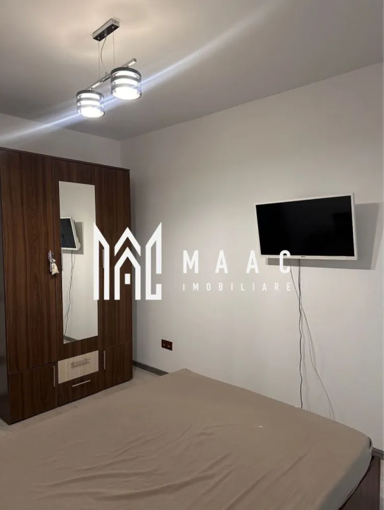 Apartament 2 camere | Etajul 6| 50MPU | Doamna Stanca - MAAC Imobiliare vă propune spre închiriere un apartament cu 2 camere, situat într-un bloc nou, parte dintr-un ansamblu rezidențial modern, în zona Doamna Stanca, lângă mall, una dintre cele mai căutate zone din Sibiu. Apartamentul este situat la etajul 6, într-un imobil cu lift, și este compartimentat eficient: living open space cu bucătăria, balcon cu vedere panoramică spre Munții Făgăraș. Beneficiază de loc de parcare privat, prevăzut cu blocator. Locuința se află la aproximativ 5 minute de mers pe jos de Shopping City Mall, iar în imediata vecinătate se regăsesc stație de autobuz, grădiniță, farmacie, clinică medicală și magazine de cartier, oferind acces facil. Închirierea se face pe termen de minim 1 an. Nu se acceptă animale de companie. Fumatul este interzis în apartament. Se percepe garanție în cuantumul unei chirii lunare. Pentru mai multe detalii și programarea unei vizionări, vă rugăm să ne contactați, menționând ID: CP2934635 }}