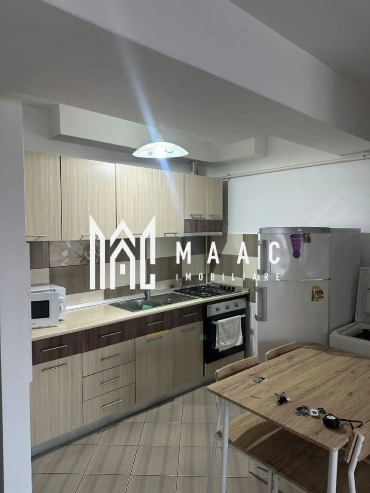 Apartament 2 camere | Etajul 6| 50MPU | Doamna Stanca - MAAC Imobiliare vă propune spre închiriere un apartament cu 2 camere, situat într-un bloc nou, parte dintr-un ansamblu rezidențial modern, în zona Doamna Stanca, lângă mall, una dintre cele mai căutate zone din Sibiu. Apartamentul este situat la etajul 6, într-un imobil cu lift, și este compartimentat eficient: living open space cu bucătăria, balcon cu vedere panoramică spre Munții Făgăraș. Beneficiază de loc de parcare privat, prevăzut cu blocator. Locuința se află la aproximativ 5 minute de mers pe jos de Shopping City Mall, iar în imediata vecinătate se regăsesc stație de autobuz, grădiniță, farmacie, clinică medicală și magazine de cartier, oferind acces facil. Închirierea se face pe termen de minim 1 an. Nu se acceptă animale de companie. Fumatul este interzis în apartament. Se percepe garanție în cuantumul unei chirii lunare. Pentru mai multe detalii și programarea unei vizionări, vă rugăm să ne contactați, menționând ID: CP2934635 }}