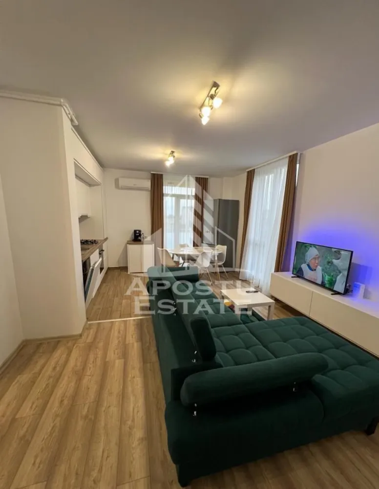 Apartament cu 3 camere, de inchiriat,zona Vivalia - APOSTU ESTATE va propune spre inchiriere un apartament cu 3 camere open-space complet mobilat si utilat situat in zona Take Ionescu in Grand Vivalia.
Imobilul este situat la etajul 6 din 7.

Imobilul se intinde pe o suprafata utila de 65 mp si este compartimentat astfel:
- hol acces
- bucatarie open space cu living
- dormitor cu dressing
- birou
- baie
- balcon deschis

Detalii:
- centrala proprie cu incalzire in pardoseala.
- electrocasnice: frigider plita cuptor electric masina de spalat rufe masina de spalat vase smart TV.
- parcare privata la subteran

Vecinatati:
- Mega Image
- Prospero
- IPJ Timis
- Piata Badea 
- Mijloace de transport in comun

Garantie 1 luna jumatate de chirie.
Nu se accepta animale de companie si sa se fumeze in incinta imobilului.
Va asteptam cu drag la o vizionare!

Oferta ID: CP3200979
