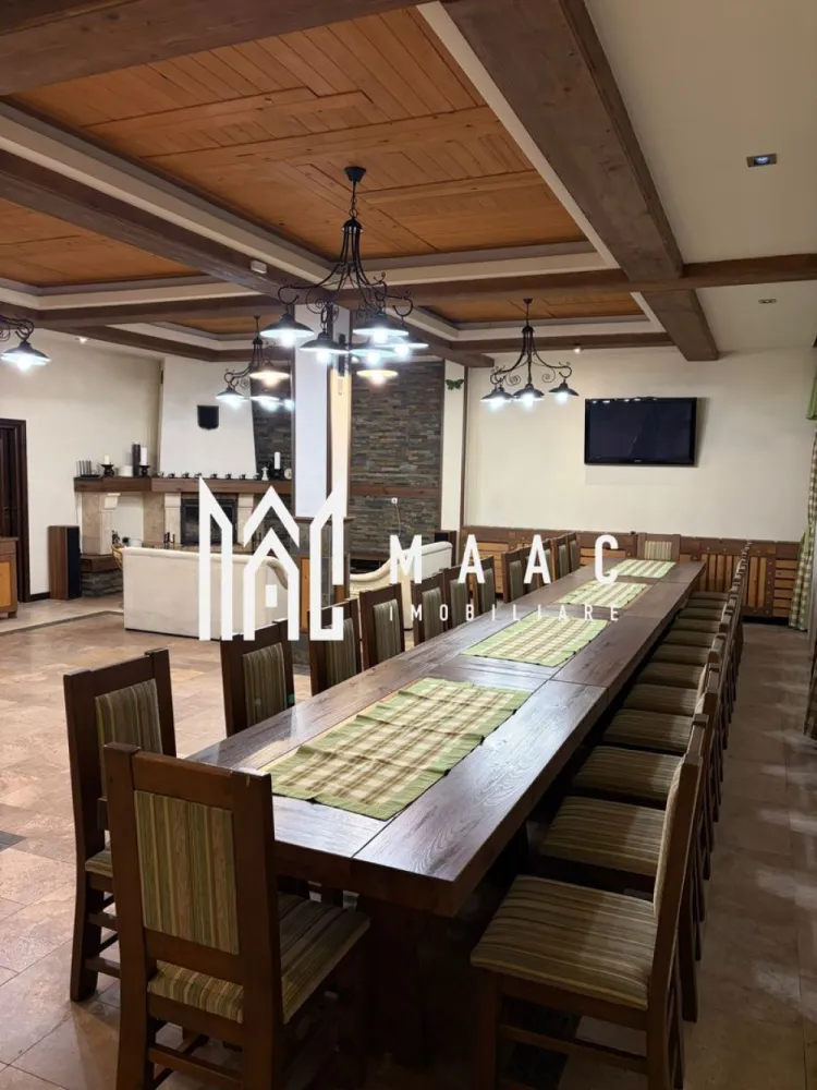 Complex turistic cu SPA I Teren 2.100 mp | 600 mp utili I Valea Lotrioarei Sibiu - MAAC va propune spre vanzare Pensiune in Valea Lotrioarei, jud. Sibiu. Proprietate turistică cu potențial ridicat | Investiție + exploatare imediată. Situată într-un cadru natural spectaculos, pe Valea Lotrioarei, județul Sibiu, Pensiunea oferă liniște, intimitate și acces direct la râu, fiind ideală atât pentru activitate turistică, cât și pentru organizarea de evenimente private sau corporate. Descriere proprietate- Pensiunea principală dispune de 12 camere, astfel: 10 camere duble cu bai, 2 apartamente, living generos, zonă de agrement cu șemineu, sală de conferințe, zonă SPA – jacuzzi și saună, bucătărie profesională cu doua compartimente. Încălzire centralizată, cu centrală proprie. Pe același teren se mai află două vile independente: - Vila 1 – 5 camere,hol si baie. - Vila 2 – 5 camere,hol si baie. Facilități exterioare: filigorie cu vedere directă la râu, zonă de relaxare amenajată la râu, în proprietate, parcare auto, magazie pentru lemne. Până la finalizarea vânzării, Pensiunea se închiriază exclusiv integral, în regim închis, fiind disponibilă pentru evenimente private, corporate, team-building-uri sau reuniuni de familie. Pensiunea se vinde ca afacere la cheie, complet funcțională și operațională, fără a necesita investiții suplimentare. Proprietatea este pregătită pentru exploatare imediată, având istoric de funcționare și potențial demonstrat de profitabilitate, fiind ideală pentru investitori care caută un business stabil în turism. Pentru mai multe detalii si programarea unei vizionari va rugam sa specificati ID: CP2861391. }}