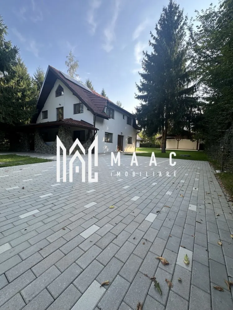 Oportunitate Valea Avrigului | Afacere la cheie | Casa de vacanta | - MAAC Imobiliare propune spre vânzare o casă de vacanță ideală pentru locuire sau investiție în turism Proprietate deosebită, perfectă pentru uz personal sau ca afacere de tip închiriere turistică (pensiune/casă de vacanță) – complet mobilată și utilată, pregătită pentru exploatare imediată! Compartimentare: Demisol tehnic – spațiu generos pentru depozitare și echipamente Parter – living spațios, bucătărie mobilată și utilată, hol, baie de serviciu, 1 dormitor cu baie proprie Etaj – 4 dormitoare, fiecare cu baie proprie Mansardă – open space întins pe întreaga suprafață a etajului Dotări exterioare: Filigorie de 60 mp – perfectă pentru relaxare sau evenimente Două terase acoperite, lipite de casă Cameră tehnică Clădire anexă – cu o cameră și baie de serviciu Utilități și facilități: Bucătărie complet mobilată și utilată Băi complet mobilate și echipate Încălzire pe toate cele trei niveluri Centrală pe peleți cu autonomie de minim 3 zile Curent monofazic Panouri solare de 2 kW – neconectate, dar cu invertor inclus, pot fi puse în funcțiune la nevoie Canalizare la fosă septică Apă din fântână proprie Ideală pentru investiție în turism – fiecare dormitor are baie proprie, multiple spații comune, facilități moderne și un potențial ridicat de închiriere. Pentru mai multe detalii va rugam specificati telefonic ID: CP2728526 }}