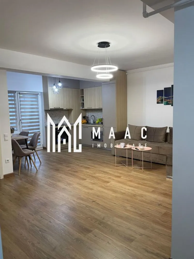 Apartament 2 camere | 54 MPU | Balcon | D. Stanca - MAAC Imobiliare vă propune spre închiriere un apartament cu 2 camere, situat pe o stradă privată dotată cu barieră în zona Doamna Stanca din Sibiu. Apartamentul dispune de compartimentare decomandată și este compus din hol de acces, bucătărie open-space cu living-ul și acces pe balcon, dormitor matrimonial și baie. Încălzirea în imobil se face cu centrala proprie prin calorifere și prin încălzire în pardoseală. Localizarea imobilului oferă acces rapid către Shopping City și mai multe supermarket-uri. Se percepe un avans și o garanție în cuantumul unei chirii lunare. Nu se acceptă animale de companie. Se predă mobilat/utilat. Aferent - parcare privată. Disponibil: 1 Martie. Pentru mai multe detalii, specificați telefonic că ați văzut anunțul cu ID: CP2936483 }}