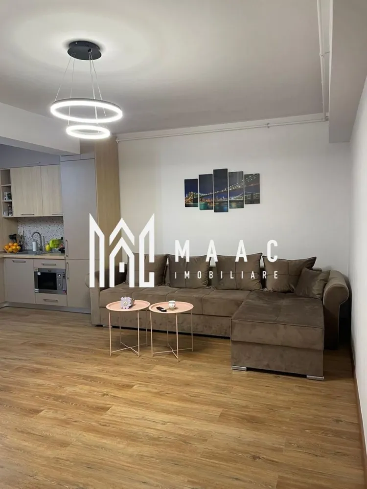 Apartament 2 camere | 54 MPU | Balcon | D. Stanca - MAAC Imobiliare vă propune spre închiriere un apartament cu 2 camere, situat pe o stradă privată dotată cu barieră în zona Doamna Stanca din Sibiu. Apartamentul dispune de compartimentare decomandată și este compus din hol de acces, bucătărie open-space cu living-ul și acces pe balcon, dormitor matrimonial și baie. Încălzirea în imobil se face cu centrala proprie prin calorifere și prin încălzire în pardoseală. Localizarea imobilului oferă acces rapid către Shopping City și mai multe supermarket-uri. Se percepe un avans și o garanție în cuantumul unei chirii lunare. Nu se acceptă animale de companie. Se predă mobilat/utilat. Aferent - parcare privată. Disponibil: 1 Martie. Pentru mai multe detalii, specificați telefonic că ați văzut anunțul cu ID: CP2936483 }}