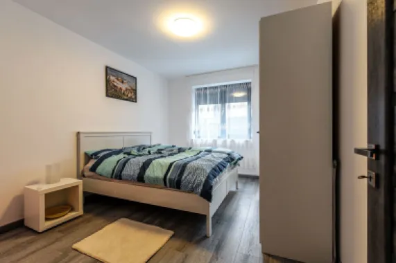Apartament ultracentral cu loc de parcare, 2 camere cu terasa proprie