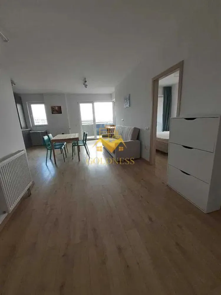 2 camere, modern, bloc nou, garaj,terasa, Gheorgheni Grand Park, Sopor - GOLDNESS Imobiliare vă propune spre închiriere un apartament cu 2 camere open space, complet mobilat și utilat, la etajul 4 într-un imobil de 10 etaje, în Cartierul Gheorgheni. Dispune de loc de parcare subteran contra cost 50 euro! Se află în apropierea stațiilor de transport în comun, magazine, restaurante, spații verzi, farmacii, etc. Apartamentul este compartimentat astfel: - dormitor cu canapea extensibila, dressing. - living cu bucatarie open space complet utilată și mobilată, canapea extensibilă, loc de servit masa - baie cu cabina de dus, calorifer port prosop și dulap pentru depozitare. - terasa de 6 mp. Imobilul este dotat cu toate cele necesare- centrală proprie, frigider, aragaz, hotă, mașină de spălat haine si vase, AC, televizor, etc. Dacă sunteți interesați de acest apartament și doriți să îl vizionați, dar și pentru alte oferte nu ezitați să ne contactați telefonic sau prin e-mail. Vă stăm la dispoziție! Pentru intermediere se percepe un comision de 50% din prețul chiriei! }}