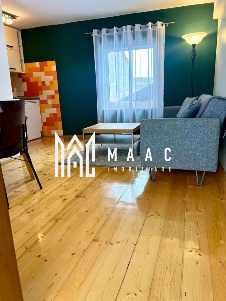 Apartament 2 camere | Terasa | Curte | Modern | Central - MAAC Imobiliare propune atentiei dumneavoastra un apartament cu 2 camere modern, complet mobilat si utilat, in zona Centrala (la 3 minute de inima orasului Sibiu - Piata Mare). Locuinta este situata etajul 1 al unui imobil de tip casa si este alcatuita din living cu bucatarie open space, dormitor, baie si terasa. Accesul este privat, imobilul se afla intr-o curte cu supraveghere video. Contoare separate la apa, gaz si curent, conexiune rapida internet. Finisaje si mobilier de calitate buna, ambient placut. Se percepe o chirie in avans si garantie in cuantumul unei chirii lunare. Se inchiriaza pe o perioada de minim 12 luni. Nu se accepta cu animale de companie. Disponibil din 6 ianuarie 2026. Pentru mai multe detalii sau pentru a programa o vizionare, va rugam specificati telefonic ID: CP2817191 }}
