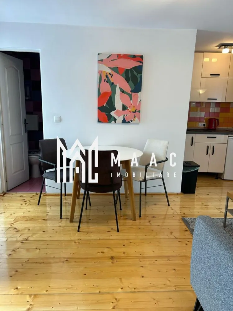 Apartament 2 camere | Terasa | Curte | Modern | Central - MAAC Imobiliare propune atentiei dumneavoastra un apartament cu 2 camere modern, complet mobilat si utilat, in zona Centrala (la 3 minute de inima orasului Sibiu - Piata Mare). Locuinta este situata etajul 1 al unui imobil de tip casa si este alcatuita din living cu bucatarie open space, dormitor, baie si terasa. Accesul este privat, imobilul se afla intr-o curte cu supraveghere video. Contoare separate la apa, gaz si curent, conexiune rapida internet. Finisaje si mobilier de calitate buna, ambient placut. Se percepe o chirie in avans si garantie in cuantumul unei chirii lunare. Se inchiriaza pe o perioada de minim 12 luni. Nu se accepta cu animale de companie. Disponibil din 6 ianuarie 2026. Pentru mai multe detalii sau pentru a programa o vizionare, va rugam specificati telefonic ID: CP2817191 }}