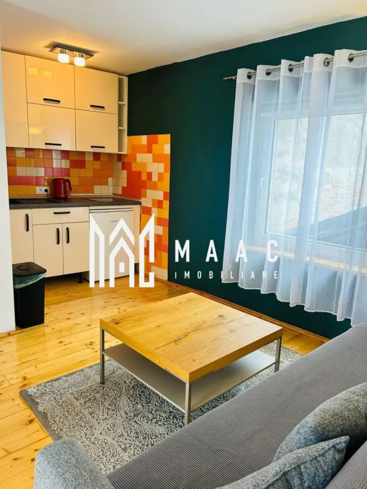 Apartament 2 camere | Terasa | Curte | Modern | Central - MAAC Imobiliare propune atentiei dumneavoastra un apartament cu 2 camere modern, complet mobilat si utilat, in zona Centrala (la 3 minute de inima orasului Sibiu - Piata Mare). Locuinta este situata etajul 1 al unui imobil de tip casa si este alcatuita din living cu bucatarie open space, dormitor, baie si terasa. Accesul este privat, imobilul se afla intr-o curte cu supraveghere video. Contoare separate la apa, gaz si curent, conexiune rapida internet. Finisaje si mobilier de calitate buna, ambient placut. Se percepe o chirie in avans si garantie in cuantumul unei chirii lunare. Se inchiriaza pe o perioada de minim 12 luni. Nu se accepta cu animale de companie. Disponibil din 6 ianuarie 2026. Pentru mai multe detalii sau pentru a programa o vizionare, va rugam specificati telefonic ID: CP2817191 }}