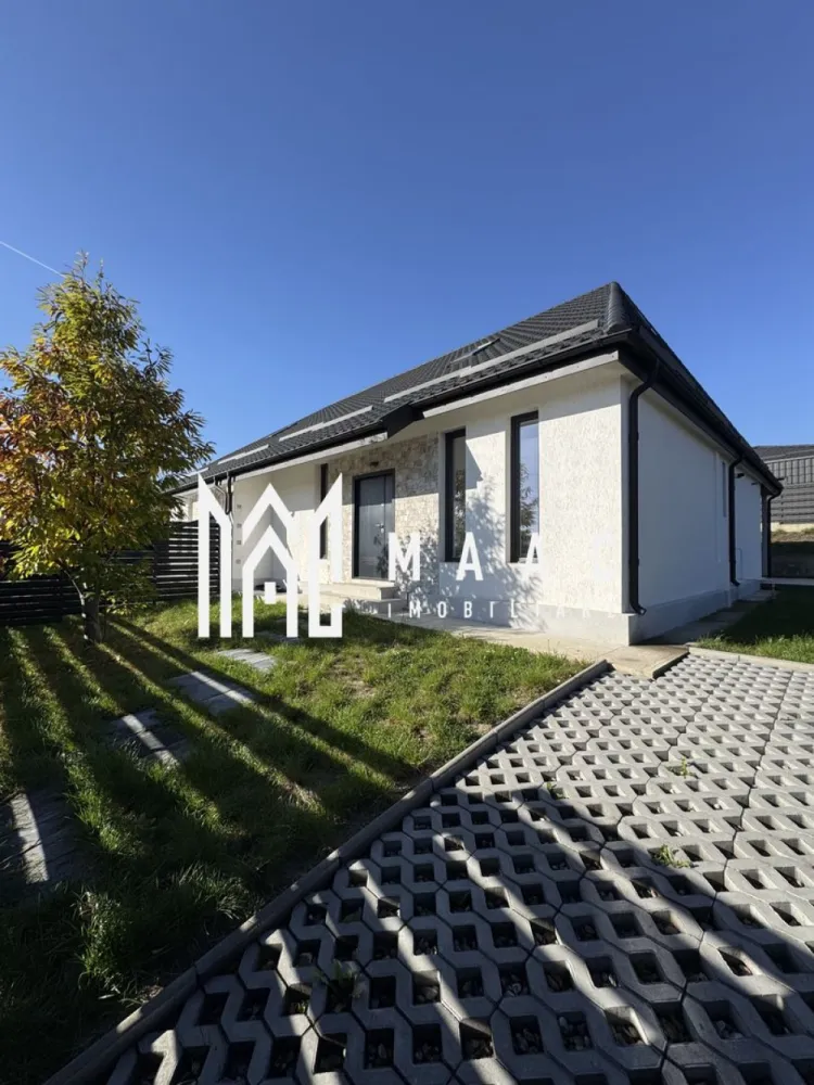 Casa 4 Camere | Teren 300MP | Zona - Vladesti Priporu - MAAC Imobilaire va propune spre vanzare o casa P+M in Vladesti - Priporu An finalizare 2025,stare noua nelocuita,finisata si functionala 100% suprafata teren 300mp supr.construita -165mp terasa acoperita -20mp 1.Compartimentare interioara: -parter: camera zi+bucatarie deschisa , birou, dormitor baie cu wc lavoar cada camera tehnica debara spatiu depozitare -etaj - suita matrimoniala cu dressing room si baie(lavoar wc cada) 2.Sistem constructiv: -structura mixta Beton Armat si zidarie DUROTHERM 30S-parter,mansarda sarpanta din lemn+OSB3 tratate si ignifugate -invelitoare tabla otel RODACH GERMAN SIMETRIC profilata vopsita negru mat -termosistem cu polistiren 10cm EPS80 + tencuiala decorativa Webber si tamplarie PVC Salamander ROTO Click culoare gri cu geam termopan 4SEASONS -instalatii sanitare termice teava PPR, elemente cupru, PHDE, toate zonele cu pardoseala incalzita iar in dormitoare radiatoare panouri otel -instalatii electrice cupru si aparate montate(prize,intrerupatoare Panasonic + corpuri iluminat LED in bai si casa scarii) -finiaje interioare tencuieli cu gled ipsos, compartimentari rigips cu zugraveli lavabile, placari faianta bai si bucatarie, scara interioara placata gresie, pardoseli parchet laminat 8mm in dormitoare,gresie bai si bucatarie living room, bai complet utilate(cada,vas WC,lavoar) usi de interior CLASSEN GERMAN OAK -curtea exterioara- cu gradina amenajata(fara plante), 1loc parcare alei acces pavaj, trotuare perimetrale betonate, gard lateral beton sipca metal porti acces front stradal metal usi garaj automate cu 2telecomenzi 3.Utilitati: -bransamente utilitati- curent electric 220VHidroelectrica - apa si canalizare APAVIL, -gaz Engie (centrala IMMERGAS VICTRIX Terra 28kw montata inclusa cu ISCIR efectuat) -CP2815425 }}