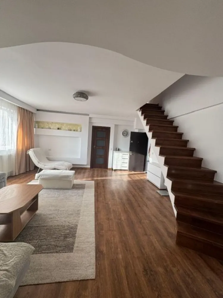 Apartament spațios, 4 camere, 120 mp, etaj 5/5, bloc nou cu lift - Vă oferim spre vânzare un apartament modern, situat la etajul 5 din 5 al unui bloc nou Suprafață utilă: 120 mp Compartimentare: Etaj inferior: living generos, bucătărie spațioasă, dormitor, baie, balcon Etaj superior (acces prin scară interioară): două dormitoare , baie, dressing. Apartamentul beneficiază de o compartimentare practică, ideală pentru o familie, cu spații bine delimitate și luminoase. Scara interioară adaugă un plus de eleganță și funcționalitate. Dispune de 2 locuri de parcare supraterane. Zonă liniștită,zona mall, aproape de facilități (transport, magazine, școli) Ideal ca locuință de familie sau investiție. Pentru mai multe informații sau pentru a programa o vizionare, nu ezitați să ne contactați! }}