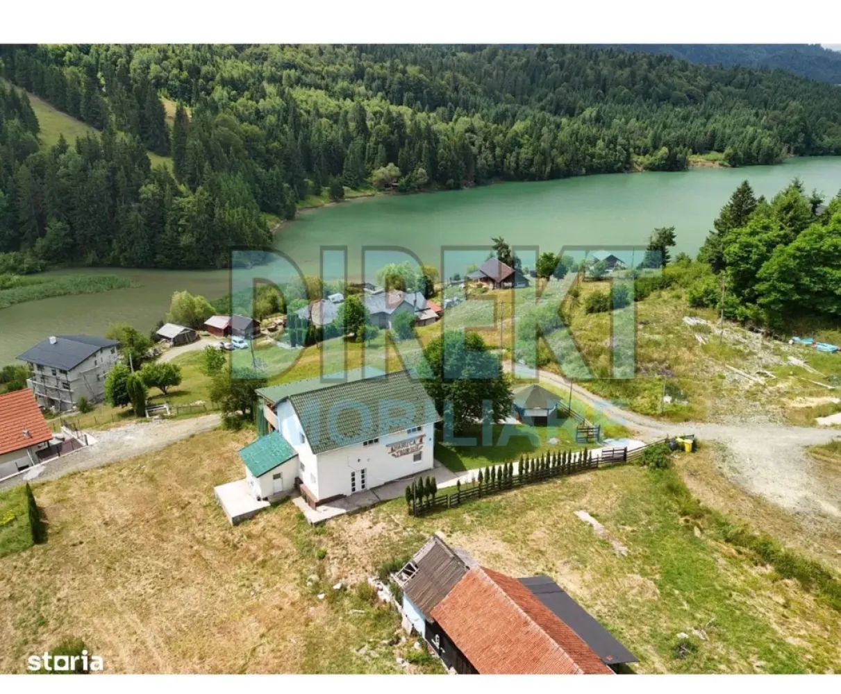 Teren intravilan,Coada lacului Colibita , ideal pt cabana! - Agentia Direkt Imobiliare vinde teren intravilan in suprafata de 1000 mp , situat la Coada Lacului Colibita , cu priveliste deosebita asupra lacului Colibita , cunoscut drept Marea de la munte . Utilitati disponibile : curent electric , 2 cai de acces . Ideal pentru constructie cabana , casa de vacanta , sau investitie turistica . Un loc de vis pentru cei care vor sa se retraga in mijlocul naturii . }}