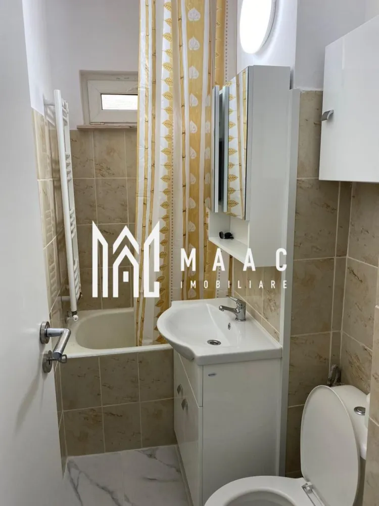 Apartament 2 camere nedecomandat | Hipodrom 2, Sibiu | 38 mp - Apartament cu 2 camere de închiriat în Sibiu, zona Hipodrom 2, cu 38 mp utili, situat la etajul 3 al unui imobil finalizat și pregătit pentru mutare din 15 iulie.

Detalii proprietate:
• Suprafață utilă: 38 mp
• Suprafață construită: 46 mp
• Compartimentare: nedecomandat
• Configurație: living, dormitor, bucătărie, baie
• Etaj 3 din 4
• Imobil finalizat, construit în 1970
• Stare interioară: bună
• Se închiriază complet mobilat și utilat
• Mobilierul și electrocasnicele sunt în stare foarte bună
• Scară de bloc curată și bine întreținută

Zonă și acces:
Proprietatea este amplasată în cartierul Hipodrom 2 din Sibiu, cu acces facil către magazine, mijloace de transport, școli și alte puncte de interes. În apropiere sunt disponibile numeroase locuri de parcare, iar zona este apreciată pentru liniște și accesibilitate.

Disponibil pentru închiriere începând cu 15 iulie. Pentru detalii suplimentare și programarea unei vizionări, contactați echipa MAAC Imobiliare și menționați Cod anunț CP3197842.