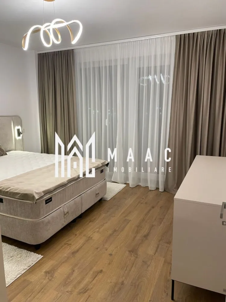 Apartament 2 camere decomandat | Șelimbăr | prima închiriere - Apartament de închiriat cu 2 camere decomandat în Șelimbăr, în ansamblul Evolution Residence, cu 60 mp utili, balcon și loc de parcare privat, disponibil la prima închiriere.

Detalii proprietate:
• Suprafață utilă: 60 mp
• Suprafață construită: 72 mp
• Compartimentare: 1 dormitor, living, bucătărie open-space, baie și balcon
• Etaj 2 din 10
• Imobil finalizat în 2022
• Stare interioară bună
• Complet mobilat și utilat
• Mașină de spălat rufe și mașină de spălat vase
• Mobilier și electrocasnice noi
• Loc de parcare privat inclus

Apartamentul este situat în ansamblul rezidențial Evolution Residence, un complex nou, apreciat pentru confortul locuirii. Zona oferă acces facil către principalele puncte de interes ale orașului și un cadru rezidențial liniștit, aflat în continuă dezvoltare.

Cod anunț CP3199606. Contactați echipa MAAC Imobiliare pentru detalii suplimentare și pentru a programa o vizionare.