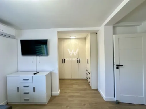 Casa la cheie, curte individuala, jaluzele electrice, aer conditionat