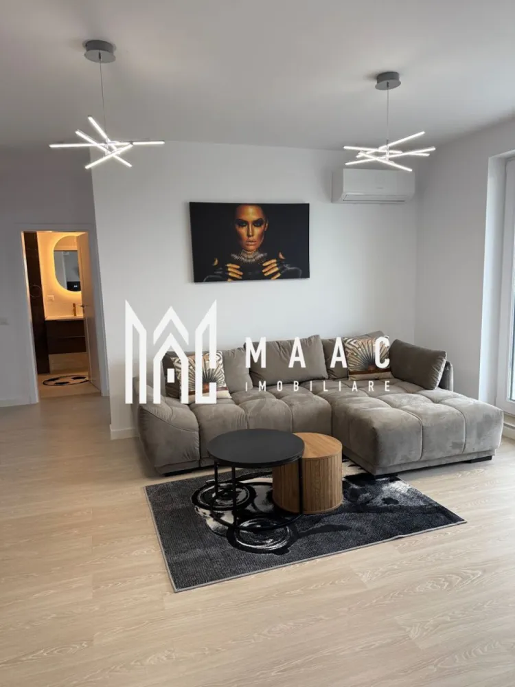Apartament 3 camere nou | 2 balcoane | Parcare | Decomandat - MAAC IMOBILIARE aduce in atentia dumneavoastra, spre inchiriere, un apartament cu 3 camere, nou, la prima inchiriere, in zona Mihai Viteazu - Doamna Stanca (Evolution Residence). Detalii apartament: • Suprafață: 75 mp • Compartimentare: 3 camere (living+ 2 dormitoare) • Etaj 5 / cu 2 lifturi moderne • 2 balcoane spațioase cu access din living si ambele dormitoare, suprafața balcoane 23mp Dotări si beneficii: • Complet mobilat modern si utilat cu electrocasnice de calitate • Living luminos, open-space, cu bucatarie complet echipata • Dormitoare spațioase, fiecare cu ieșire pe balcon • Baie elegantă, finisaje premium • Bloc nou, dotat cu lifturi rapide si silențioase • Încălzire centrală (prin pardoseala), costuri reduse la întreținere • Loc de parcare disponibil Avantaj zona: • Cartier rezidențial modern si sigur • Acces rapid către centrul orașului • Aproape de supermarketuri, restaurante, Promenada mall, transport public Se percepe garantie in cuantumul unei chirii lunare. Se inchiriaza pe minim 12 luni. Pentru mai multe detalii precizati telefonic ca ati vazut anuntul cu ID: CP2793644 }}