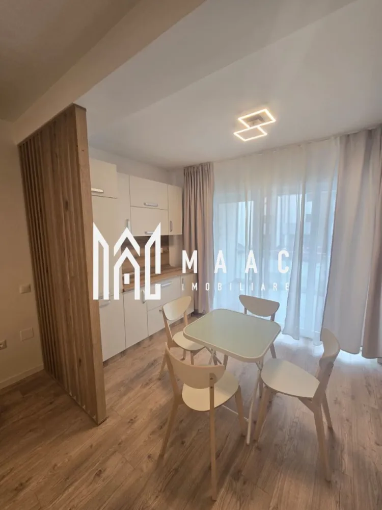 Apartament 2 camere nou | Modern | Balcon | Parcare - MAAC Imobiliare ofera spre inchiriere apartament de 2 camere, nou, complet mobilat si utilat, in zona de vest. mai exact in ansamblul rezidential DaVinci.

Locuinta are suprafata utila de 52mp si este alcatuita din hol, living open space cu bucatarie cu toate facilitatile, dormitor cu pat matrimonial, baie moderna si terasa de 18mp.

Apartamentul se afla la parterul inalt unui imobil cu regim de inaltime P+1+M, situat la intrarea in Sibiu, in cartierul rezidential DaVinci, care se remarca prin procentul ridicat de spatii verzi, constructii calitative si orientare Sudica la toate locuintele.

Se percepe o chirie in avans si garantie in cuantumul unei chirii lunare. Disponibilitate imediata.

Pentru mai multe detalii, specificati telefonic: CP3208400
