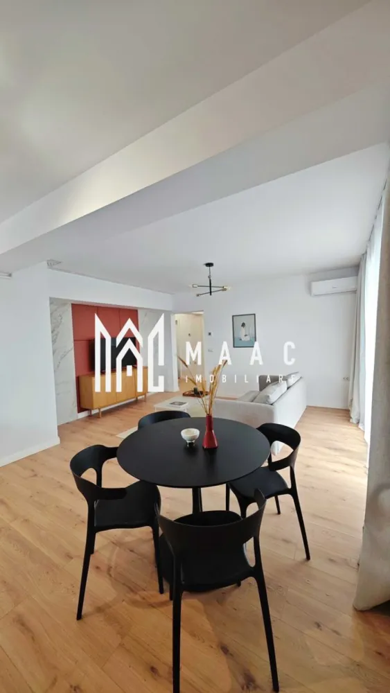 Apartament 3 camere decomandat | Șelimbăr | 74 mp, 2 băi - Apartament cu 3 camere decomandat în Șelimbăr, în complexul Evolution Apartments, cu 74 mp utili, 2 băi și 2 balcoane spațioase, disponibil la prima închiriere.

Detalii proprietate:
• Suprafață utilă: 74 mp
• Compartimentare: living cu bucătărie open-space, 2 dormitoare, 2 băi
• Etaj 2 din 6, într-un imobil finalizat în 2024
• Stadiu interior: ultrafinisat, confort lux
• 2 balcoane spațioase, de 12 mp și 9 mp
• Bucătărie complet mobilată și utilată, cu electrocasnice încorporate
• Încălzire în pardoseală și aer condiționat
• Interfon video inteligent și loc de parcare exterior inclus
• Orientare sud-est, cu lumină naturală plăcută pe parcursul zilei
• Nu se acceptă animale de companie

Zonă și acces:
Complexul oferă acces facil către Shopping City Sibiu, supermarketuri, restaurante, farmacii și principalele căi de acces către oraș. Poziționarea în Șelimbăr îl recomandă pentru un stil de locuire modern, cu acces rapid la punctele de interes din zonă.

Cod anunț CP3208643. Contactați-ne pentru o vizionare și pentru toate detaliile legate de această proprietate disponibilă acum la închiriere.

Conținut optimizat cu AI, aprobat de agent uman.