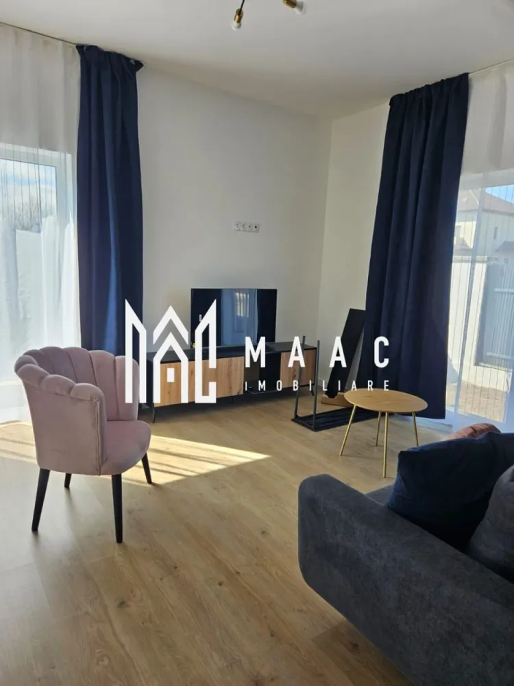 Casă modernă |5 Camere | Curte | 180 mp | Garaj | Șelimbăr - MAAC Imobiliare vă propune spre închiriere o casă spațioasă cu 5 camere, situată în Șelimbăr, ideală pentru o familie care își dorește confort, spațiu și intimitate. Locuința are o suprafață utilă de aproximativ 180 mp și este compartimentată eficient pentru a oferi funcționalitate și confort. Compartimentare: • living spațios • bucătărie închisă, complet mobilată și utilată • 3 dormitoare • 2 băi • 2 balcoane Proprietatea dispune de garaj, precum și de o curte generoasă, perfectă pentru relaxare sau petrecerea timpului liber. În curte se regăsește și o filigorie, ideală pentru momentele petrecute în aer liber alături de familie sau prieteni. Casa este complet mobilată și utilată, fiind pregătită pentru mutare imediată. Dotări și beneficii: încălzire în pardoseală garaj curte spațioasă filigorie în curte mobilată și utilată complet zonă liniștită, ideală pentru locuit Această proprietate reprezintă o alegere excelentă pentru cei care își doresc confortul unei case spațioase, într-o zonă apreciată din Șelimbăr. Pentru mai multe detalii sau pentru programarea unei vizionări, vă rugăm să ne contactați, specificând ID:CP2955557 }}