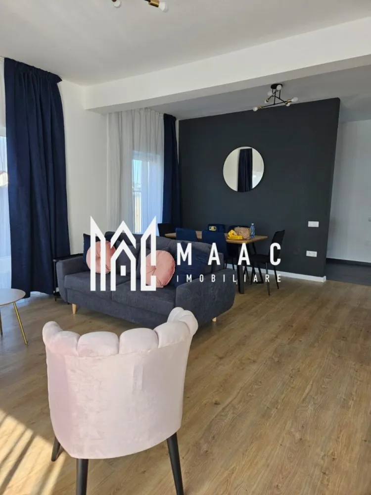 Casă modernă |5 Camere | Curte | 180 mp | Garaj | Șelimbăr - MAAC Imobiliare vă propune spre închiriere o casă spațioasă cu 5 camere, situată în Șelimbăr, ideală pentru o familie care își dorește confort, spațiu și intimitate. Locuința are o suprafață utilă de aproximativ 180 mp și este compartimentată eficient pentru a oferi funcționalitate și confort. Compartimentare: • living spațios • bucătărie închisă, complet mobilată și utilată • 3 dormitoare • 2 băi • 2 balcoane Proprietatea dispune de garaj, precum și de o curte generoasă, perfectă pentru relaxare sau petrecerea timpului liber. În curte se regăsește și o filigorie, ideală pentru momentele petrecute în aer liber alături de familie sau prieteni. Casa este complet mobilată și utilată, fiind pregătită pentru mutare imediată. Dotări și beneficii: încălzire în pardoseală garaj curte spațioasă filigorie în curte mobilată și utilată complet zonă liniștită, ideală pentru locuit Această proprietate reprezintă o alegere excelentă pentru cei care își doresc confortul unei case spațioase, într-o zonă apreciată din Șelimbăr. Pentru mai multe detalii sau pentru programarea unei vizionări, vă rugăm să ne contactați, specificând ID:CP2955557 }}