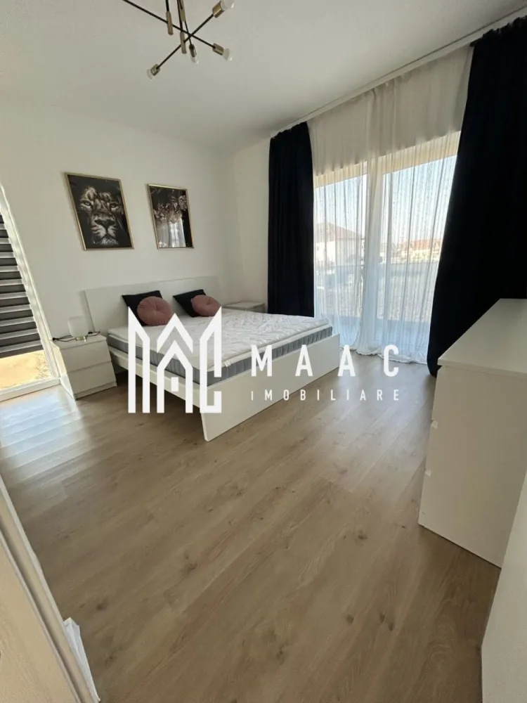 Casă modernă |5 Camere | Curte | 180 mp | Garaj | Șelimbăr - MAAC Imobiliare vă propune spre închiriere o casă spațioasă cu 5 camere, situată în Șelimbăr, ideală pentru o familie care își dorește confort, spațiu și intimitate. Locuința are o suprafață utilă de aproximativ 180 mp și este compartimentată eficient pentru a oferi funcționalitate și confort. Compartimentare: • living spațios • bucătărie închisă, complet mobilată și utilată • 3 dormitoare • 2 băi • 2 balcoane Proprietatea dispune de garaj, precum și de o curte generoasă, perfectă pentru relaxare sau petrecerea timpului liber. În curte se regăsește și o filigorie, ideală pentru momentele petrecute în aer liber alături de familie sau prieteni. Casa este complet mobilată și utilată, fiind pregătită pentru mutare imediată. Dotări și beneficii: încălzire în pardoseală garaj curte spațioasă filigorie în curte mobilată și utilată complet zonă liniștită, ideală pentru locuit Această proprietate reprezintă o alegere excelentă pentru cei care își doresc confortul unei case spațioase, într-o zonă apreciată din Șelimbăr. Pentru mai multe detalii sau pentru programarea unei vizionări, vă rugăm să ne contactați, specificând ID:CP2955557 }}