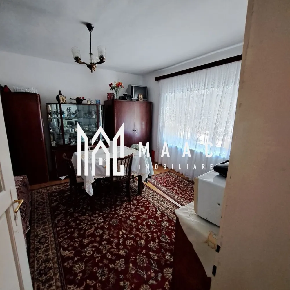 Casă individuală 2 camere | Cornățel | curte 633 mp, șură - Casă individuală cu 2 camere în Cornățel, la aproximativ 18 km de Sibiu, cu 85 mp utili, teren de 633 mp și curte cu anexe, potrivită pentru cei care caută locuire la casă aproape de oraș.

Detalii proprietate:
• Suprafață utilă: 85 mp
• Suprafață construită: 110 mp
• Teren: 633 mp
• 2 camere, 1 bucătărie separată și 1 baie
• An construcție: 1960
• 3 locuri de parcare
• Pivniță, șură de 56 mp și grădină de aproximativ 400 mp
• Utilități: gaz, curent, canalizare și apă
• Fântână cu hidrofor
• Construcție cu fundație din beton și piatră, zidărie din cărămidă și acoperiș din țiglă

Proprietatea este amplasată în satul Cornățel, comuna Roșia, cu acces rapid spre Sibiu. Curtea și grădina oferă spațiu pentru activități în aer liber, iar anexele existente pot fi utile pentru depozitare și gospodărie.

Cod anunț CP3208391. Contactați echipa MAAC Imobiliare pentru detalii suplimentare și programarea unei vizionări.