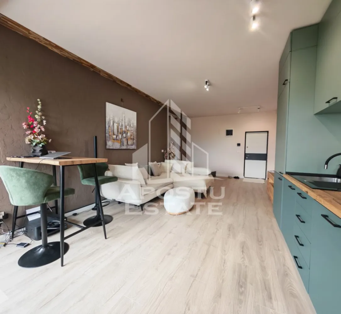 Apartament cu 2 camere de vânzare, Zona Torontalului, Timisoara - Agenţia imobiliara Apostu Estate va propune spre vânzare un apartament nou cu 2 camere ,situat în zona Torontalului,una dintre cele mai căutate zone din Timisoara . Ideal atât pentru locuinţa proprie , cat si pentru investiție 
 Imobilul este amplasat la etajul 1 din 3 cu o suprafață utilă de 52 mp și un balcon deschis de 3 mp 
 Compartimentare :
 -Bucătărie mobilată
 -Living mobilat open space cu bucătăria și ieșire pe balcon 
 -Dormitor matrimonial mobilat cu ieșire pe balcon 
 -Baie cu duș și geam la baie 
 -Balcon

 Apartamentul se vinde complet mobilat , conform pozelor
 
Confortul termic este asigurat de centrala proprie și sistemul de încălzire în pardoseală, care oferă o distribuție uniformă a căldurii și un ambient plăcut pe toată perioada sezonului rece.

 Beneficii suplimentare :
 - Compartimentare funcțională și modernă 
 - Zona liniștită perfectă pentru locuit sau investiţie
 -Geamuri Tripan 
 -Uși cu toc dublu 
 -Loc de parcare înscris în cf 

 Pentru mai multe detalii si programarea unei vizionari , va stam cu drag la dispoziţie .
 
 Agenţia imobiliara Apostu Estate vă oferă consultanta bancara gratuita prin intermediul colaboratorilor noştri pentru alegerea celui mai potrivit tip de credit , astfel încât tu să devii noul proprietar al acestui apartament
 ID INTERN: CP3209729