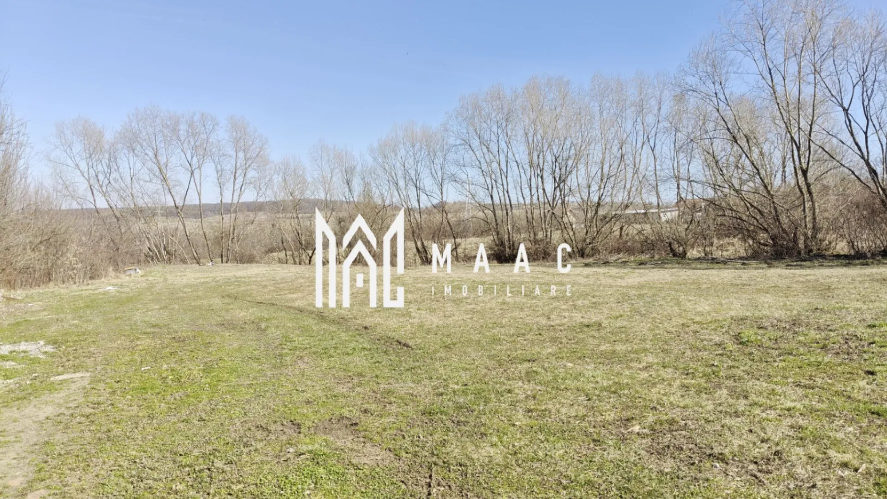 Teren intravilan I 946 mp rezidențial I Utilități I Cisnădie - MAAC Imobiliare propune spre vânzare o parcelă de teren intravilan, ideală pentru construirea unei locuințe individuale, situată într-o zonă de case noi, în raza orașului Cisnădie. Proprietatea se remarcă prin potențial ridicat, liniște și acces rapid către oraș. Caracteristici principale: -Suprafață teren: 946 mp -Clasificare: intravilan -Acces: drumul se încheie la limita proprietății -Geometrie: formă neregulată, cu suprafață generoasă, potrivită pentru construcții, curte și anexe -Vecinătăți: construcții existente doar pe una dintre laturile terenului -Panoramă: vedere frumoasă către orașul Cisnădie Utilități: -Gaz, apă, canalizare și curent electric la limita ultimei proprietăți, la aproximativ 15 m -Zonă în dezvoltare, cu infrastructură în curs de extindere Terenul este potrivit pentru casă individuală, locuință modernă sau duplex, fiind amplasat într-o zonă liniștită, înconjurată de natură, ideală pentru proiecte rezidențiale care necesită spațiu amplu și intimitate. Pentru mai multe detalii sau pentru programarea unei vizionări, vă rugăm să menționați telefonic că ați văzut anunțul cu numărul de CP: CP2889738. }}