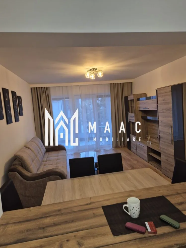 Apartament 2 Camere I Etaj 1 I Modern I DAVINCI - MAAC Imobiliare va propune spre inchiriere un apartament cu 2 camere decomandate. Apartamentul este situat intr-un cartier rezidential construit recent si dispune: -de balcon, - încălzire în pardoseala, -loc de parcare - video interfon, -rulouri electrice la geam. -complet mobilat si utilat . Locatia este la 2 min de zona industrială și aeroport. Se închiriază pe o perioada de minim 1 an. Nu sunt acceptate animale de companie. Se percepe o garantie in cuantulul unei chirii lunare. Pentru mai multe detalii specificati telefonic ca ati vazut anuntul cu ID:CP2966941 . }}