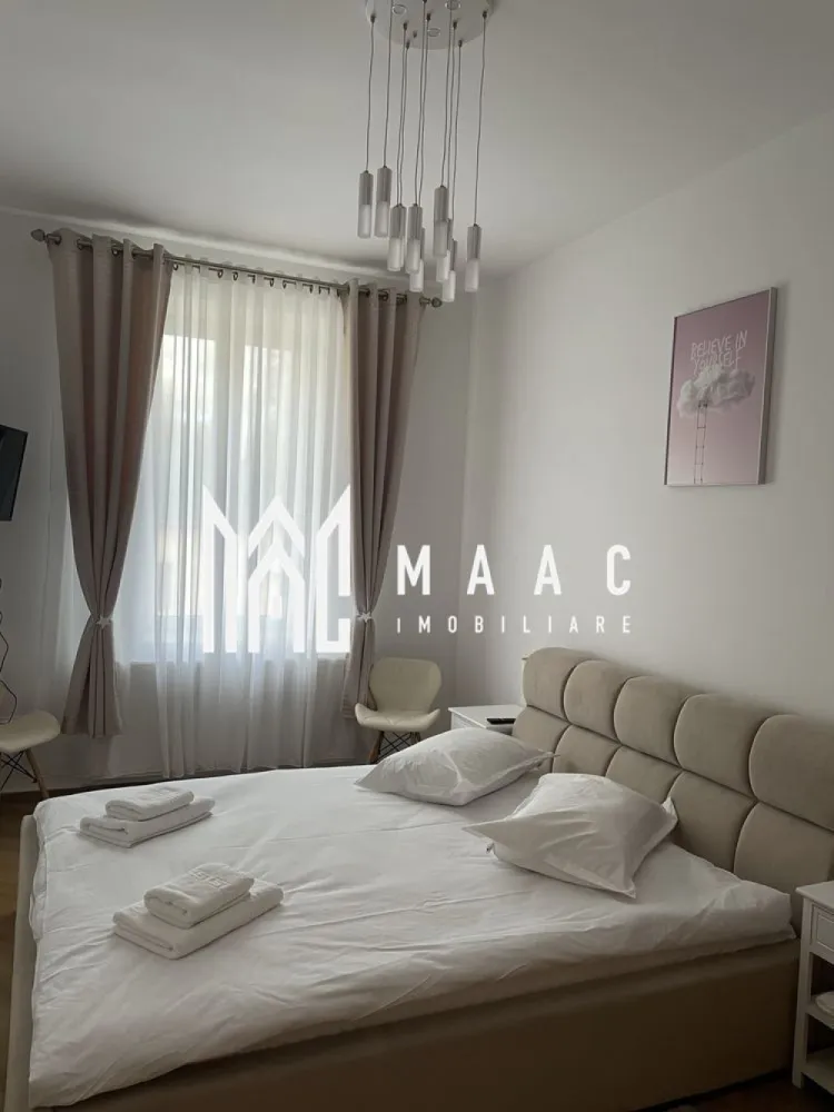 Apartamente 3 camere | Parcare | 105 MP | Zonă Centrală - MAAC Imobiliare vă propune spre vânzare două apartamente situate la casă, într-o zonă centrală a orașului Sibiu, într-o locație ideală atât pentru locuire, cât și pentru activități profesionale. Proprietățile sunt înscrise pe același CF și pot fi utilizate pentru locuință, cabinet medical, sediu de firmă, birouri sau alte activități, beneficiind de vizibilitate bună datorită geamurilor orientate către stradă. Imobilele se află într-o stare foarte bună și nu necesită investiții suplimentare. Acoperișul este nou, clădirea beneficiază de izolație termică exterioară, iar interiorul a fost complet renovat. Proprietatea dispune, de asemenea, de pivniță, loc de parcare și o cotă parte de 33% din curtea comună, oferind spațiu suplimentar și confort. Zona centrală reprezintă un avantaj important, cu acces rapid către instituții, magazine, restaurante, transport public și principalele puncte de interes ale orașului. Pentru mai multe detalii sau pentru a programa o vizionare, vă rugăm să ne contactați. Specificați ID-ul CP2959701. }}
