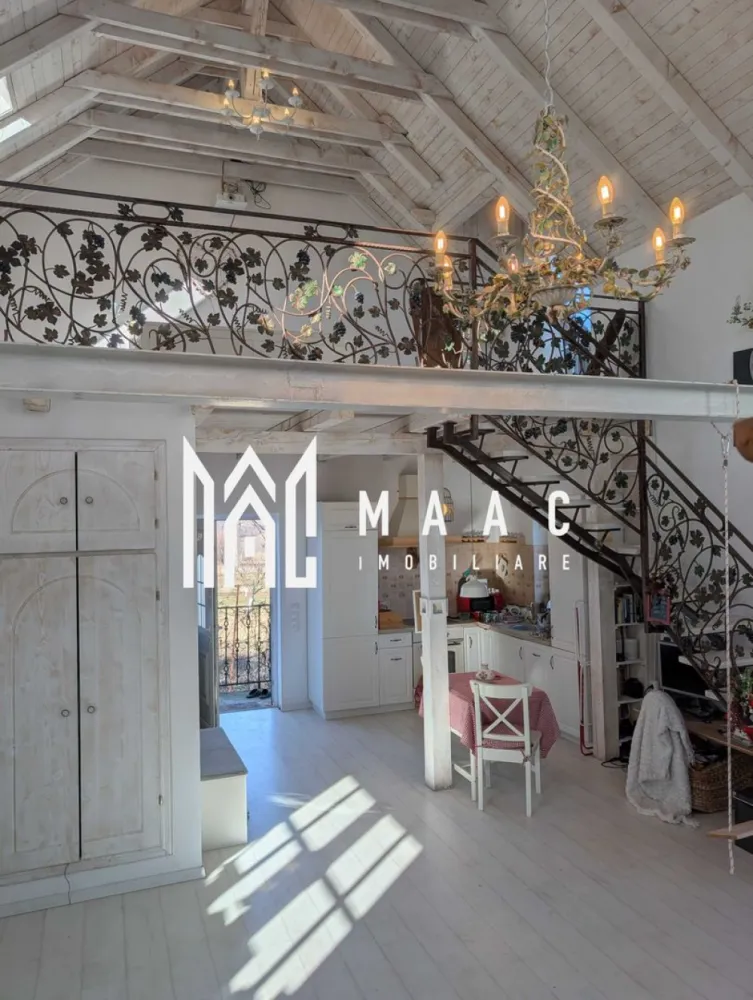 Casă | Daia Nouă | Priveliște spre Munții Făgăraș - MAAC Imobiliare vă propune spre închiriere o casă, situată în mijlocul naturii, la aproximativ 10 km de Sibiu, în localitatea Daia Nouă. Proprietatea este amplasată într-o zonă liniștită, oferind intimitate deplină și o priveliște spectaculoasă către Munții Făgăraș.. Compartimentare • open-space generos (zonă de living) • dormitor la mansardă • bucătărie complet utilată • baie Proprietatea beneficiază de o grădină spațioasă, amenajată pentru relaxare și activități în aer liber, care include: • heleșteu • foișor • zonă pentru răsaduri • pomi fructiferi Proprietarii se ocupă de întreținerea grădinii, inclusiv tunsul ierbii, compostare, plantare și pregătirea lemnelor de foc. Dotări și beneficii • încălzire cu șemineu pe lemne și pompă de căldură • instalație fotovoltaică de 5 kW • aer condiționat • video-proiector în dormitor • sursă proprie de apă și sistem propriu de epurare • costuri de întreținere reduse datorită eficienței energetice ridicate Proprietatea oferă intimitate totală, neavând vecini în fața casei sau pe laterale. Se acceptă animale de companie de talie mică și medie. Pentru mai multe detalii sau pentru programarea unei vizionări, vă rugăm să ne contactați și să menționați ID-ul proprietății: CP2966835. }}