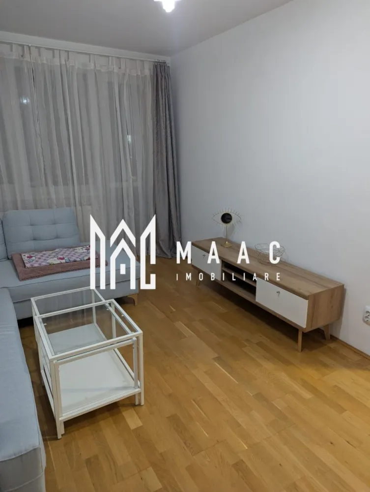 Apartament 3 camere | 80 MPU | Balcon | Mihai Viteazu - MAAC Imobiliare vă propune spre închiriere un apartament cu 3 camere situat pe bulevardul Mihai Viteazu, amplasat la etajul 4 al unui imobil dotat cu lift. Proprietatea dispune de o suprafață utilă de 80 mp și a fost renovată, oferind un spațiu confortabil și funcțional, potrivit pentru locuire pe termen lung într-una dintre zonele bine conectate ale orașului. Apartamentul beneficiază de centrală termică proprie pentru un control eficient al temperaturii și de mașină de spălat, iar baia este prevăzută cu aerisire naturală, un avantaj important pentru confortul zilnic. Caracteristici: -apartament cu 3 camere -suprafață utilă de 80 mp -etaj 4 -imobil cu lift -centrală termică proprie -mașină de spălat -renovat -baie cu aerisire Nu sunt acceptate animale de companie. Se percepe o garanție în cuantumul unei chirii lunare. Perioada minimă de închiriere este de 12 luni. Pentru mai multe detalii, vă rugăm să specificați telefonic că ați văzut anunțul cu numărul CP2967801. }}