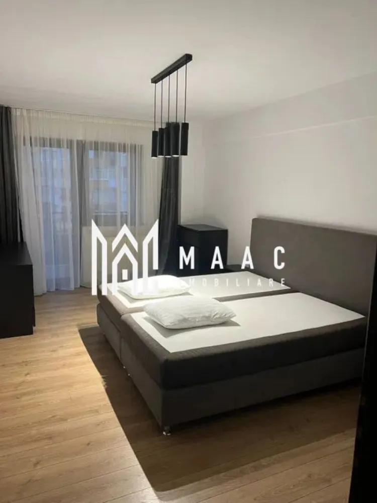 Apartament Decomandat 116 mp | Parcare Subterană |- Mihai Viteazu - MAAC Imobiliare vă propune spre închiriere un apartament spațios, decomandat, cu o suprafață utilă de 116 m², situat în zona Mihai Viteazu din Sibiu, într-un imobil modern, construit după anul 2000. Localizat la etajul 3 al unui bloc prevăzut cu lift, apartamentul impresionează prin compartimentare și confort. Acesta este format din 2 dormitoare luminoase, living generos, bucătărie complet utilată, 2 băi, dressing și 2 terase, ideale pentru momente de relaxare. Locuința se oferă complet mobilată și utilată, beneficiind de o izolație termică foarte buna. Un atu important îl reprezintă locul de parcare subteran. Apartamentul este ideal pentru o familie sau pentru cei care își doresc un spațiu generos într-o zonă bine conectată la puncte de interes precum magazine, transport public, școli și centre comerciale. Pentru mai multe detalii precizati telefonic ca ati vazut anuntul cu ID:CP2834046 }}