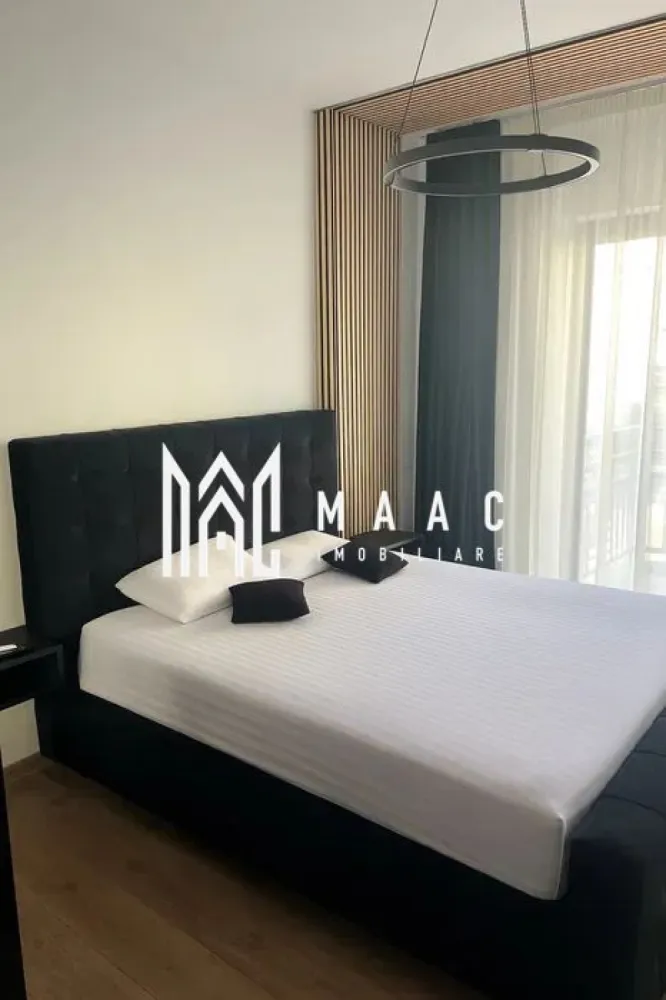 Apartament Decomandat 116 mp | Parcare Subterană |- Mihai Viteazu - MAAC Imobiliare vă propune spre închiriere un apartament spațios, decomandat, cu o suprafață utilă de 116 m², situat în zona Mihai Viteazu din Sibiu, într-un imobil modern, construit după anul 2000. Localizat la etajul 3 al unui bloc prevăzut cu lift, apartamentul impresionează prin compartimentare și confort. Acesta este format din 2 dormitoare luminoase, living generos, bucătărie complet utilată, 2 băi, dressing și 2 terase, ideale pentru momente de relaxare. Locuința se oferă complet mobilată și utilată, beneficiind de o izolație termică foarte buna. Un atu important îl reprezintă locul de parcare subteran. Apartamentul este ideal pentru o familie sau pentru cei care își doresc un spațiu generos într-o zonă bine conectată la puncte de interes precum magazine, transport public, școli și centre comerciale. Pentru mai multe detalii precizati telefonic ca ati vazut anuntul cu ID:CP2834046 }}