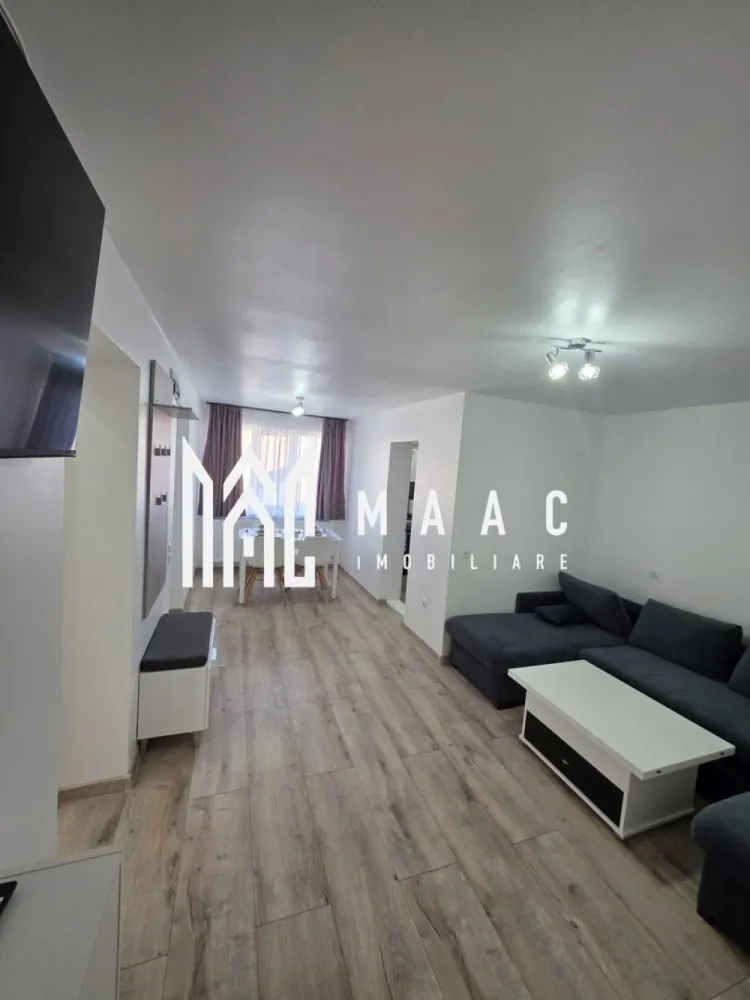 Apartament la casă | 4 camere | 91mpu | Valea Aurie - MAAC Imobiliare vă propune spre închiriere sau vânzare un apartament spațios cu 4 camere, situat la casă, în zona Valea Aurie, pe Calea Poplăcii, una dintre cele mai apreciate zone rezidențiale din Sibiu. Apartamentul are o suprafață utilă de 91 mp și beneficiază de o compartimentare practică și confortabilă. Locuința este compusă din trei dormitoare decomandate, living generos cu zonă de dining, bucătărie separată și două băi, oferind spațiu suficient pentru o familie. Zona Valea Aurie reprezintă un mare avantaj, fiind cunoscută pentru liniște, spații verzi și acces rapid către punctele de interes ale orașului, precum magazine, școli, grădinițe, mijloace de transport și zone de recreere. Apartamentul se închiriază la prețul de 650 euro/lună. Pentru mai multe detalii sau pentru a programa o vizionare, vă rugăm să ne contactați. Specificați ID-ul CP2969305. }}