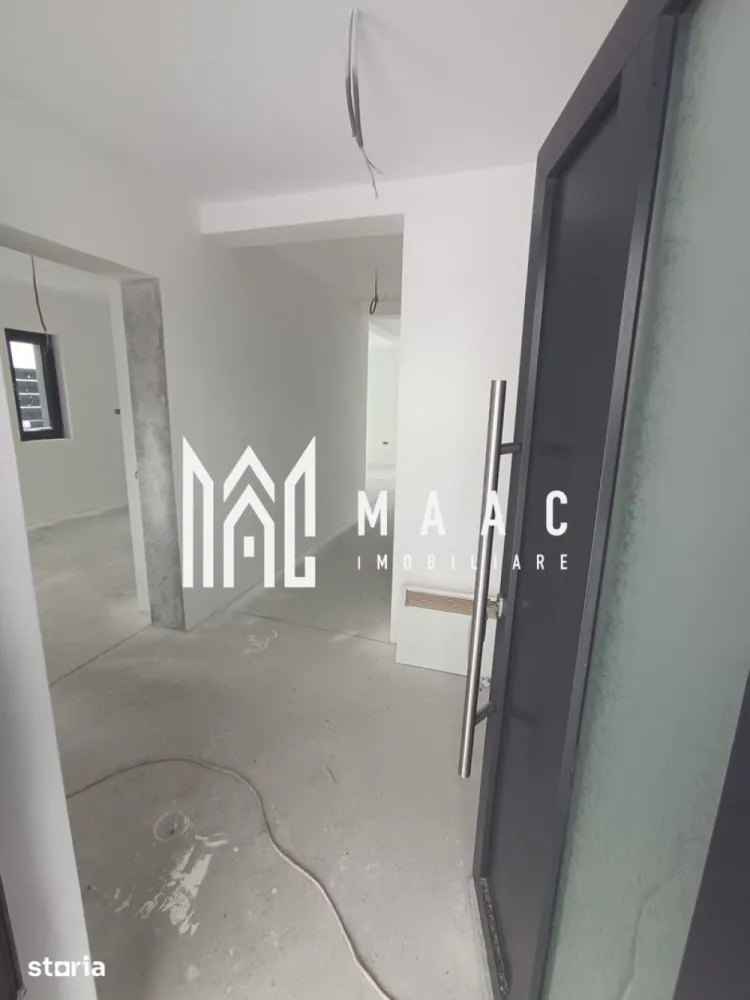Casă 5 camere de vânzare | Șura Mică, Sibiu | 165 mp - Casă de vânzare cu 5 camere în Șura Mică, aproape de Sibiu, cu 165 mp utili, teren de 350 mp și construcție din 2026, în stadiu la gri, pregătită pentru personalizare.

Detalii proprietate:
• Casă individuală, cu suprafață utilă de 165 mp și suprafață construită de 231 mp
• Teren de 350 mp
• Construcție din cărămidă, finalizată în 2026
• Stadiu actual: la gri
• 5 camere
• Terasă de 27 mp la ultimul nivel, cu panoramă spre munți
• Încălzire în pardoseală instalată
• Utilități racordate: apă, canalizare, curent electric și gaz
• Tâmplărie Salamander și izolație din lână de lemn
• Exterior finalizat cu fațadă modernă, pavaj și gard perimetral

Proprietatea este amplasată în Șura Mică, într-o zonă nouă de case, aerisită și liniștită, cu acces rapid către Sibiu. Panorama deschisă spre munți și configurația terenului completează un cadru potrivit pentru locuire într-un ansamblu rezidențial nou.

Dacă îți dorești o casă nouă pe care să o finisezi după propriul stil, contactează echipa MAAC Imobiliare pentru detalii suplimentare și programarea unei vizionări. Cod anunț CP3210509.

Conținut optimizat cu AI, aprobat de agent uman.