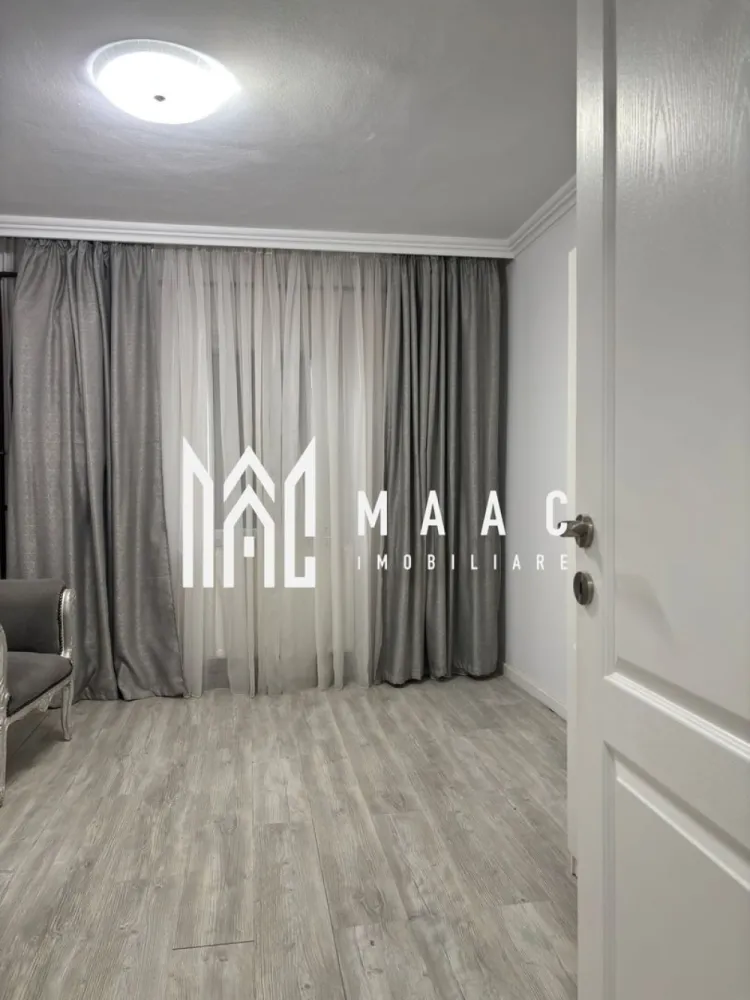 Apartament 3 camere Traian | Parter | Centrala Termica - MAAC Imobiliare vă propune spre vânzare un apartament renovat cu 3 camere, situat la parterul unui bloc P+4, într-un imobil liniștit, cu doar 2 apartamente pe etaj. Apartamentul are o suprafață utilă de 64 mp și este total decomandat, compartimentarea fiind practică și bine organizată: living spațios, 2 dormitoare, bucătărie separată, hol generos și baie. În prezent există și posibilitatea amenajării unei a doua băi de serviciu, spațiul fiind folosit momentan ca dressing. Imobilul a fost renovat integral și până de curând a funcționat ca salon estetic, fiind o opțiune excelentă atât pentru locuință, cât și pentru activitate comercială (salon, birou, cabinet etc.), datorită poziționării la parter. Îmbunătățiri și dotări: renovat integral centrală termică proprie sistem de alarmă se predă gol și proaspăt zugrăvit în alb Datorită compartimentării decomandate și a poziționării la parter, apartamentul este ideal atât pentru locuit, cât și pentru investiție sau activități comerciale. Pentru mai multe detalii sau pentru a programa o vizionare, contactați echipa MAAC Imobiliare. CP2896492 }}