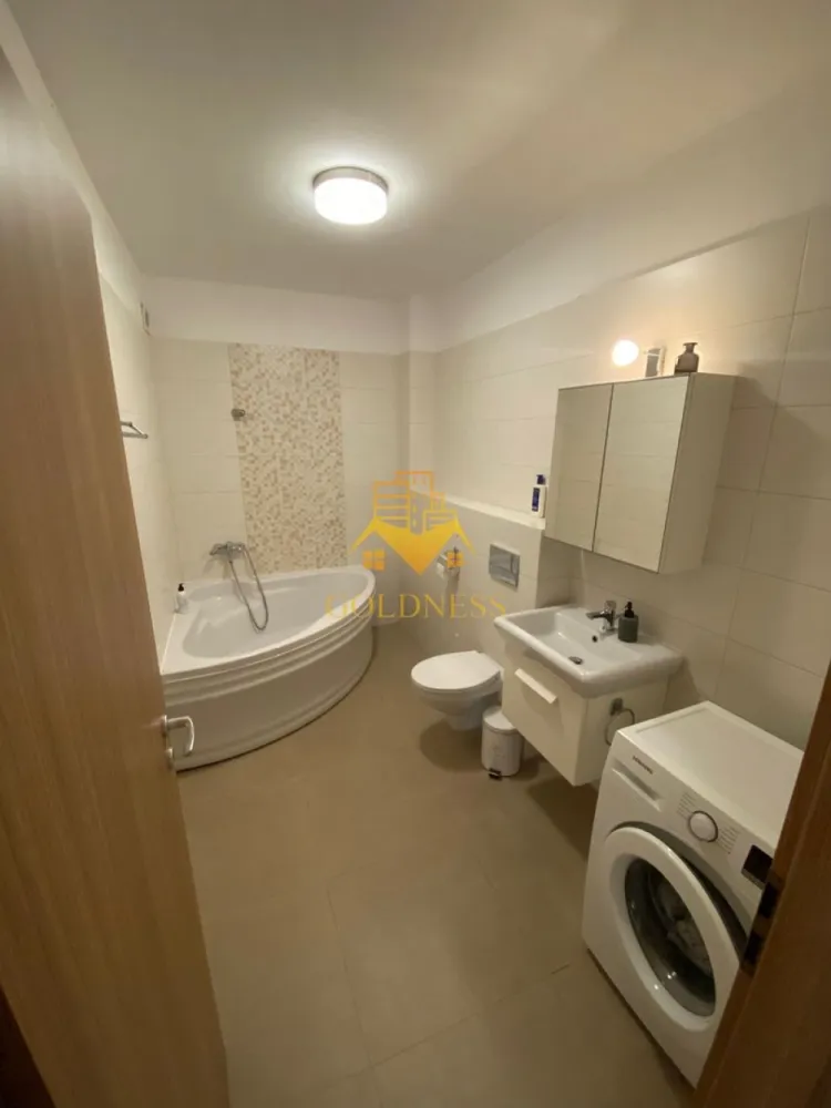 2 camere, modern, garaj, bloc nou,Buna Ziua, Bonjour Residence, Sophia - GOLDNESS Imobiliare vă propune spre închiriere un apartament cu 2 camere complet mobilat și utilat, la etajul 2 într-un imobil de 8 etaje, în Cartierul Buna ZIua. Dispune de loc de parcare subterana! Se află în apropierea stațiilor de transport în comun, magazine, restaurante, spații verzi, farmacii, etc. Apartamentul este compartimentat astfel: - dormitor cu pat matrimonial, noptiere, spatiu pentru depozitare - living cu canapea exntesibila, spatiu pentru depozitare, 2 dressinguri - bucatarie complet mobilata, utilata, loc de luat masa - baie cu cada, calorifer port prosop și dulap pentru depozitare. - terasa de 7 mp. Imobilul este dotat cu toate cele necesare- centrală proprie, mașină de spălat haine, frigider, plită electrică, hotă, etc. Dacă sunteți interesați de acest apartament și doriți să îl vizionați, dar și pentru alte oferte nu ezitați să ne contactați telefonic sau prin e-mail. Vă stăm la dispoziție! Pentru intermediere se percepe un comision de 50% din prețul chiriei! }}