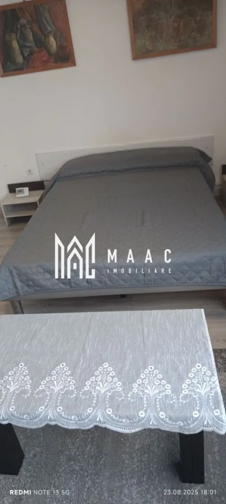 Apartament 2 camere la casa | Etaj 1 | Central - Piata Cluj - MAAC Imobiliare va propune spre inchiriere un apartament la casa, cu suprafata utila de 50 MP, format din living cu bucatarie open-space, dormitor, baie Apartamentul este dotat cu mobilier modern format din dulapuri haine , birou cu scaun ,1 TV,coltar extensibil in living, bucataria dotata cu mobilir modern,combina frigorifica,baie cu dus si masina de spalat rufe . In 10 minute se poate ajunge in Piata Cibin si in centrul Sibiului,magazine in aptropiere ,multe mijloace de transport in comun. Loc de parcare se gaseste usor in fata cladirii, sau in apropiere. Nu se accepta animale de companie in incinta. Se inchiriaza pe termen lung, minim 1 an si se percepe o garantie in cuantumul unei chirii lunare. Disponibilitate imediata. Pentru mai multe detalii precizati telefonic ca ati vazut anuntul cu ID: CP2975807 }}