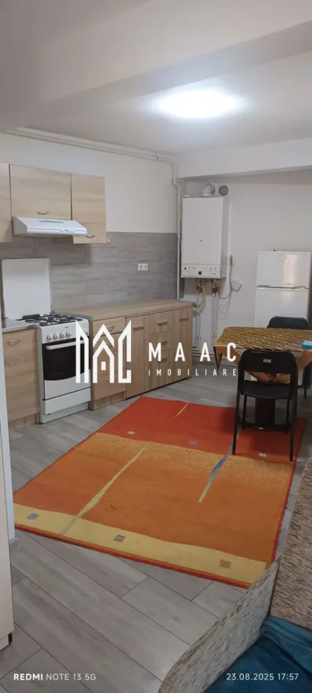 Apartament 2 camere la casa | Etaj 1 | Central - Piata Cluj - MAAC Imobiliare va propune spre inchiriere un apartament la casa, cu suprafata utila de 50 MP, format din living cu bucatarie open-space, dormitor, baie Apartamentul este dotat cu mobilier modern format din dulapuri haine , birou cu scaun ,1 TV,coltar extensibil in living, bucataria dotata cu mobilir modern,combina frigorifica,baie cu dus si masina de spalat rufe . In 10 minute se poate ajunge in Piata Cibin si in centrul Sibiului,magazine in aptropiere ,multe mijloace de transport in comun. Loc de parcare se gaseste usor in fata cladirii, sau in apropiere. Nu se accepta animale de companie in incinta. Se inchiriaza pe termen lung, minim 1 an si se percepe o garantie in cuantumul unei chirii lunare. Disponibilitate imediata. Pentru mai multe detalii precizati telefonic ca ati vazut anuntul cu ID: CP2975807 }}